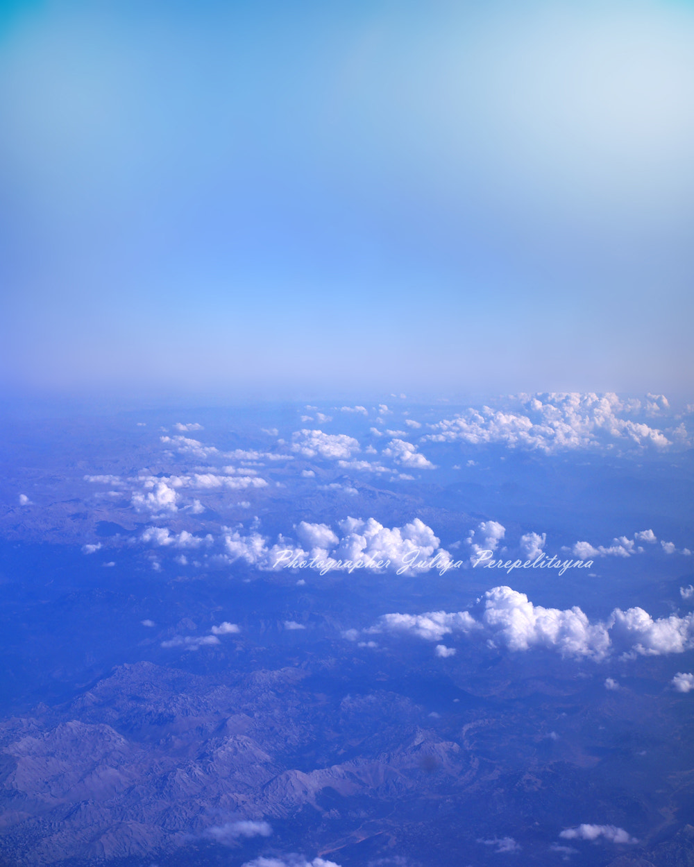 Sony SLT-A37 + Minolta AF 50mm F1.4 [New] sample photo. View from airplane. couds shined from above. photography