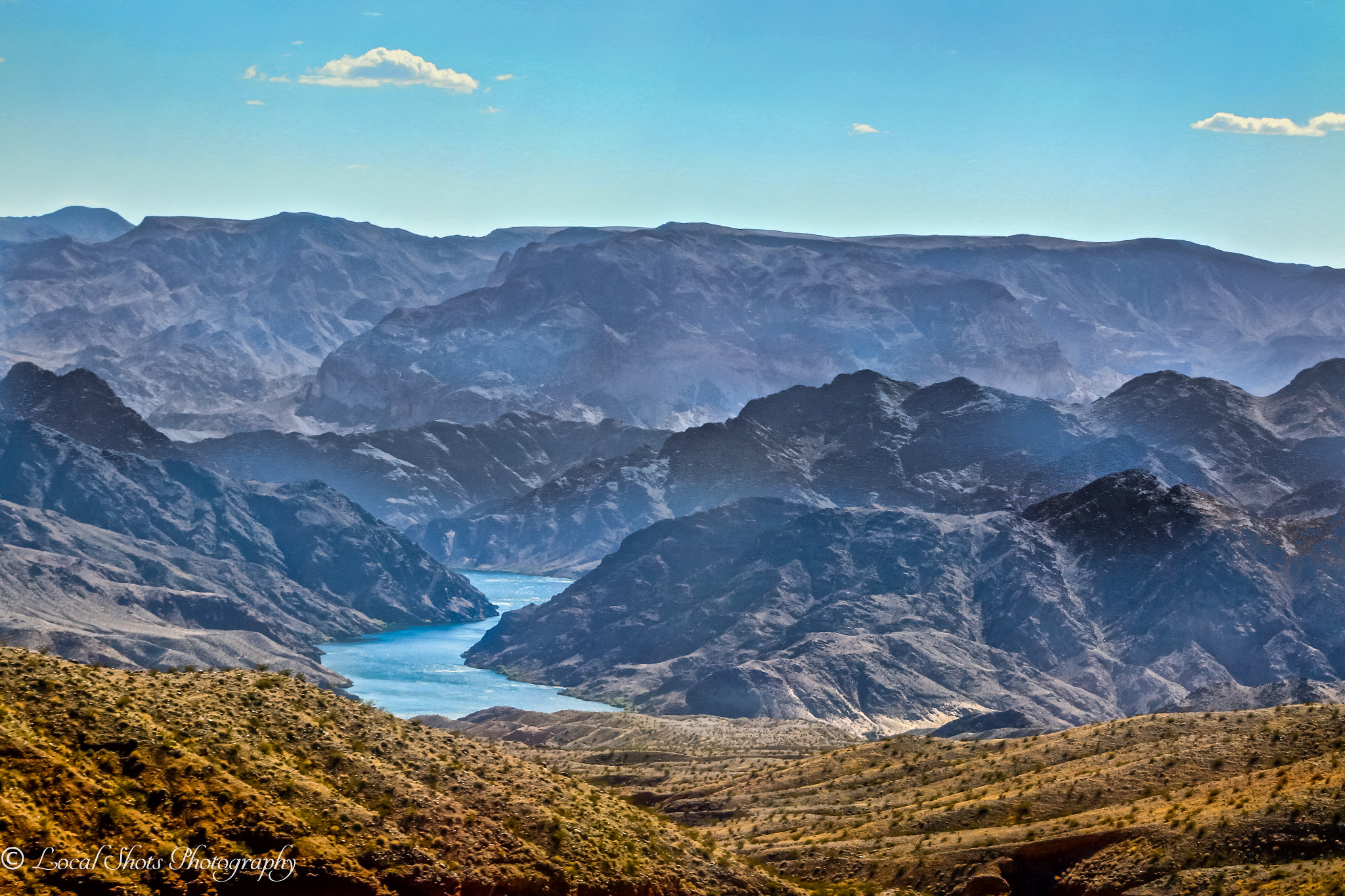 Canon EF 75-300mm f/4-5.6 USM sample photo. River running through the mountains photography
