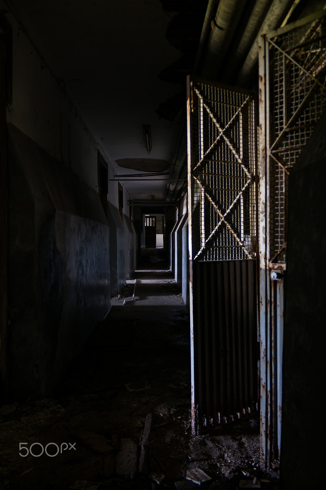 Samsung NX 18-200mm F3.5-6.3 ED OIS sample photo. Basement corridor photography
