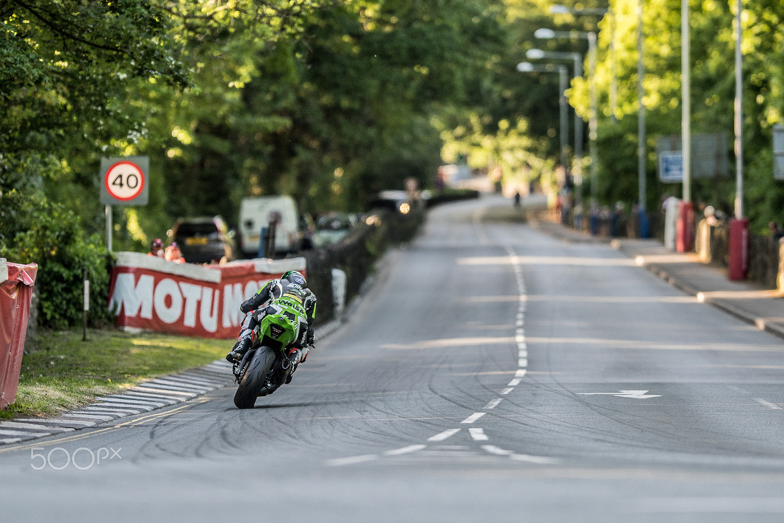 Nikon AF-S Nikkor 200mm F2G ED VR II sample photo. Laying down the rubber photography