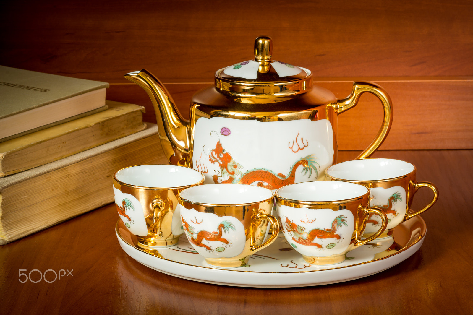 Nikon D7100 + Nikon AF Nikkor 85mm F1.8D sample photo. Traditional chinese tea pot cups party old books photography