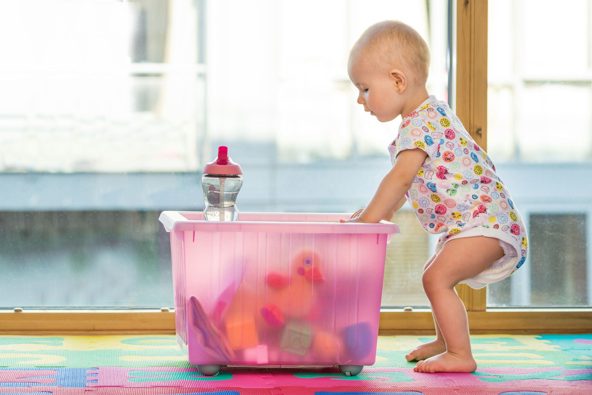 Nikon D7100 + Nikon AF Nikkor 85mm F1.8D sample photo. Little baby girl boy play with full box of toys photography
