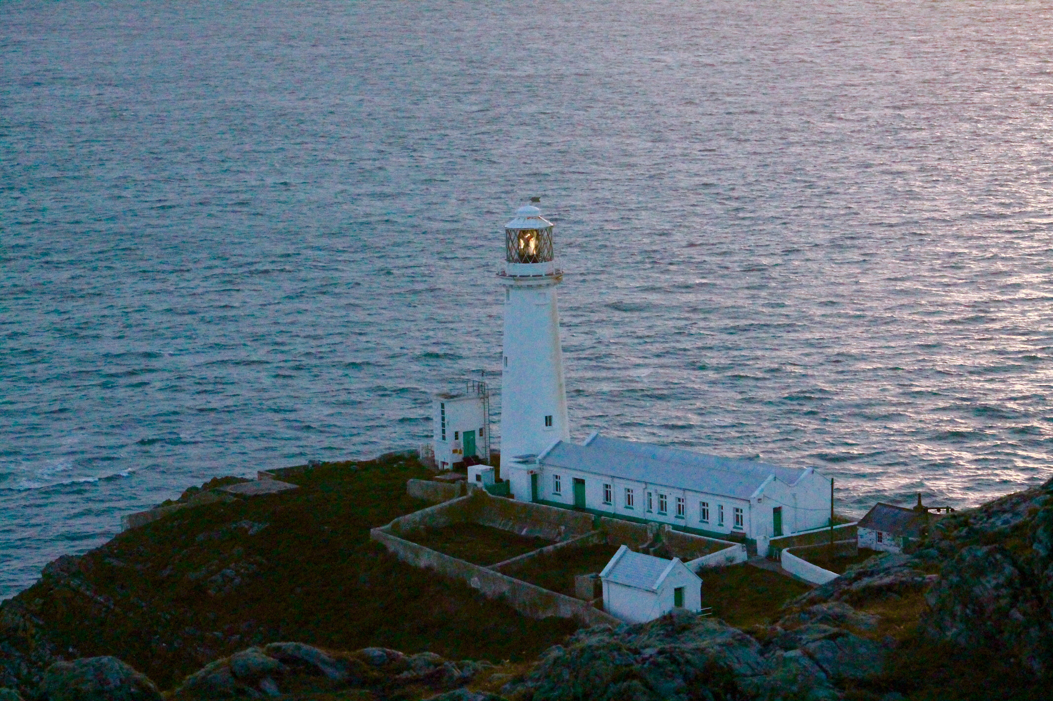 Canon EF75-300mm f/4-5.6 sample photo. South stack lighthouse anglesey under darkening skies photography