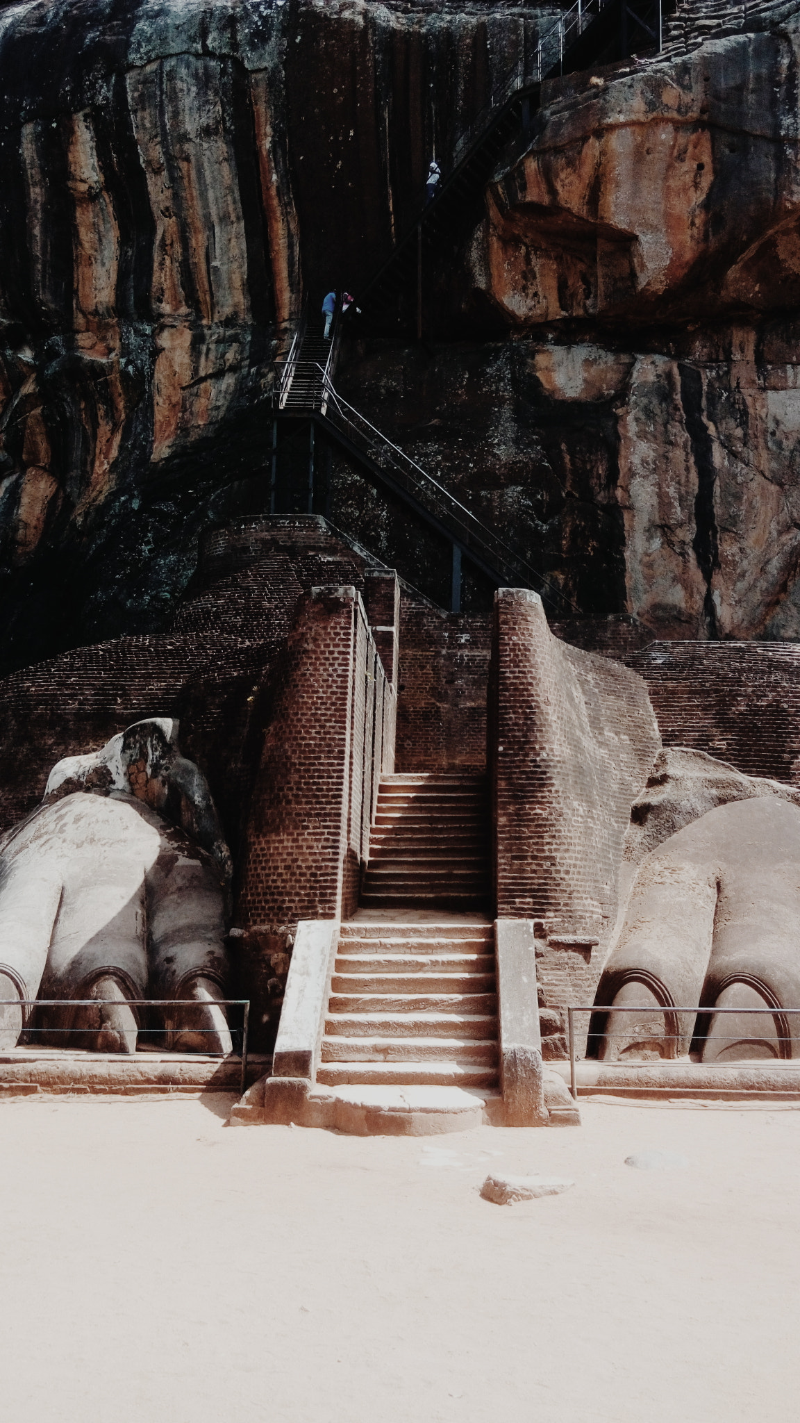 HTC D626Q sample photo. The pair of colossal lion's paws carved into the bedrock : sigiriya lion fortress  photography