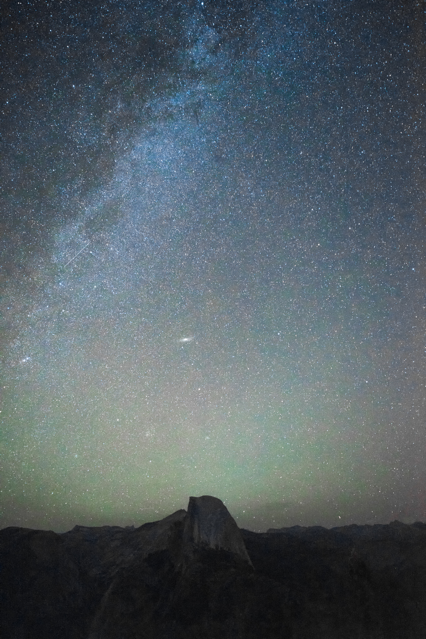 E 21mm F2.8 sample photo. Andromeda galaxy above half dome photography