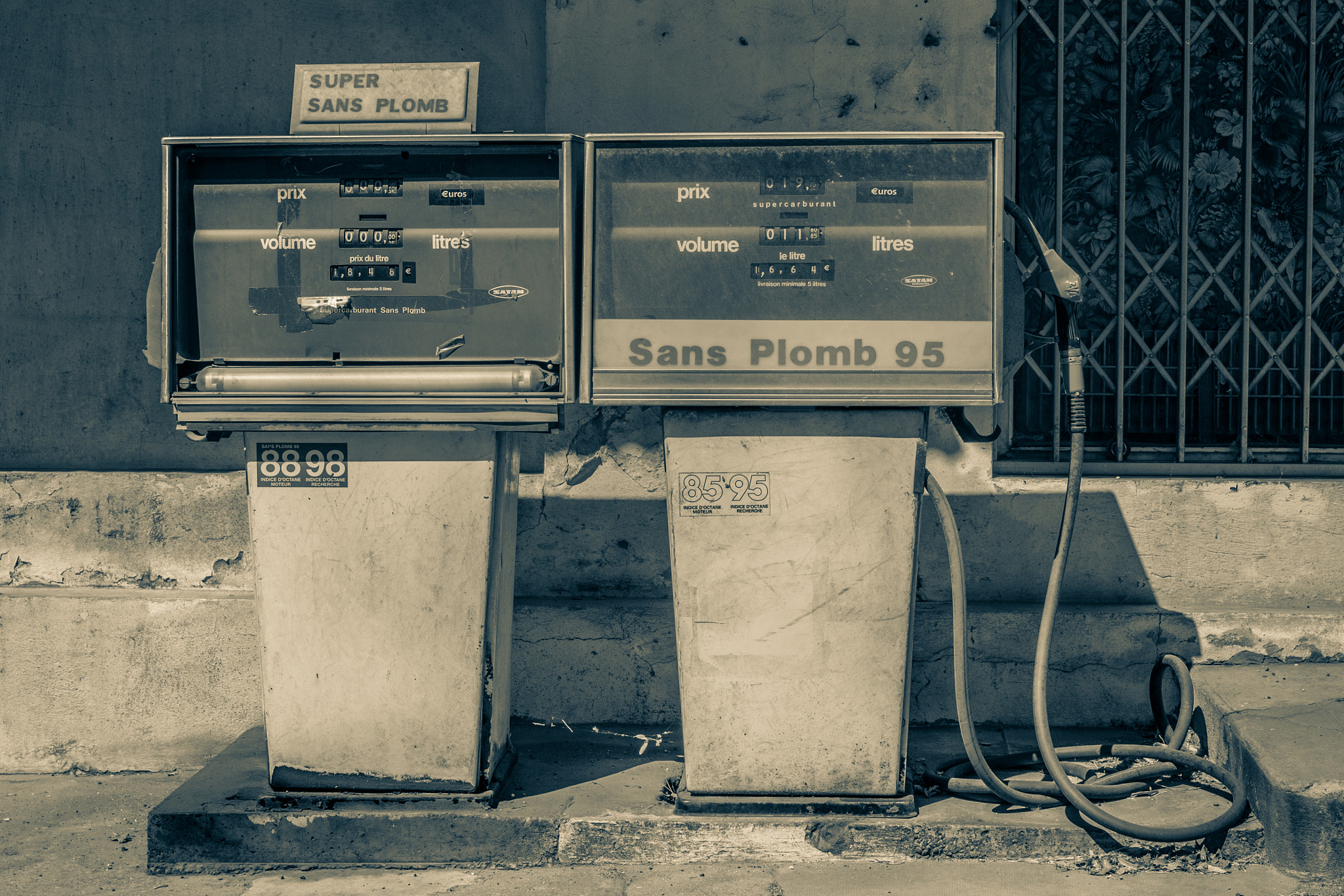 Canon EOS 60D + Canon EF 35mm F2 IS USM sample photo. Old petrol station photography