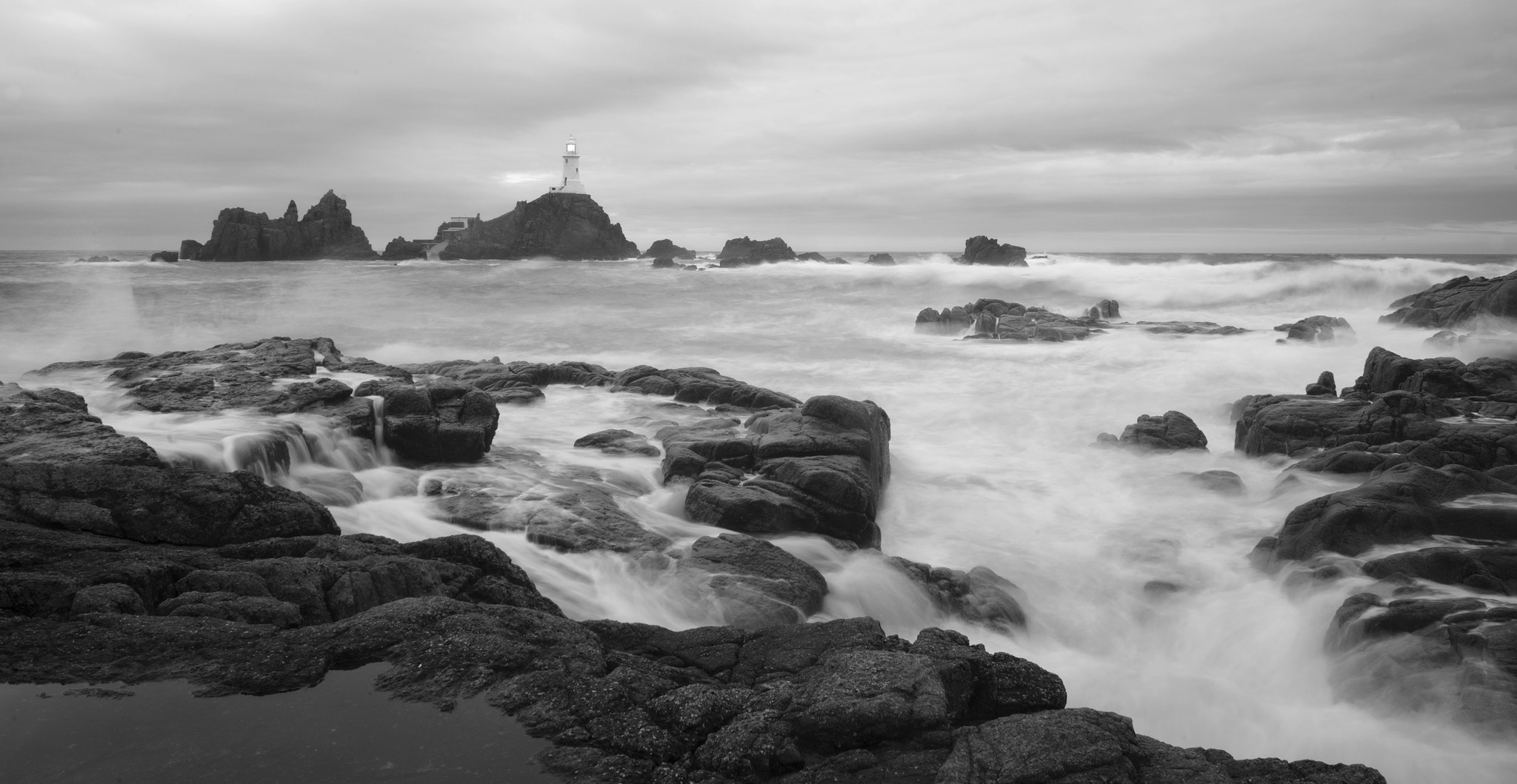 Sony a7R II + Sony FE 28-70mm F3.5-5.6 OSS sample photo. Waves break behind the lighthouse photography