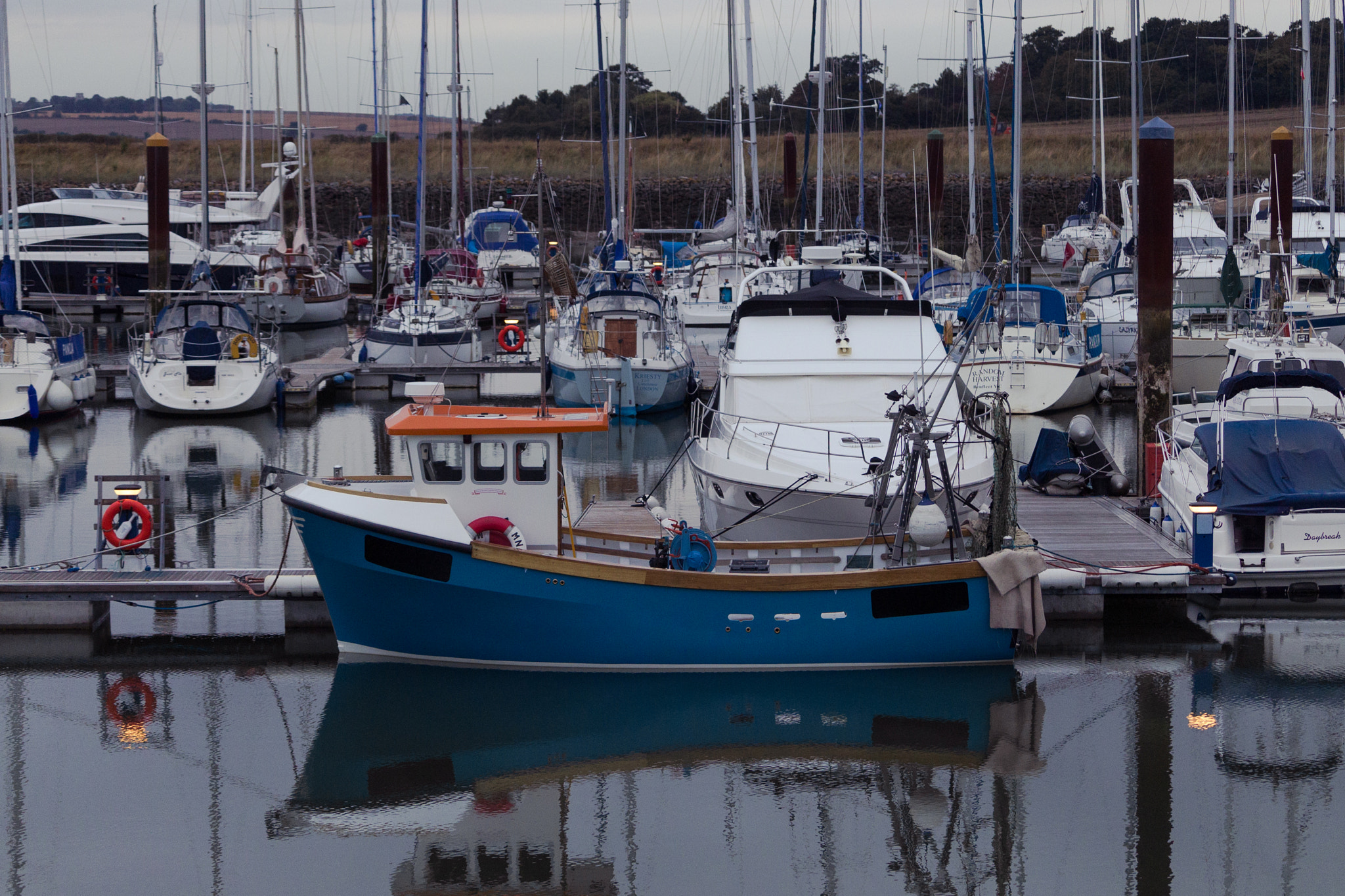 Canon EF-S 55-250mm F4-5.6 IS STM sample photo. Blue boat photography