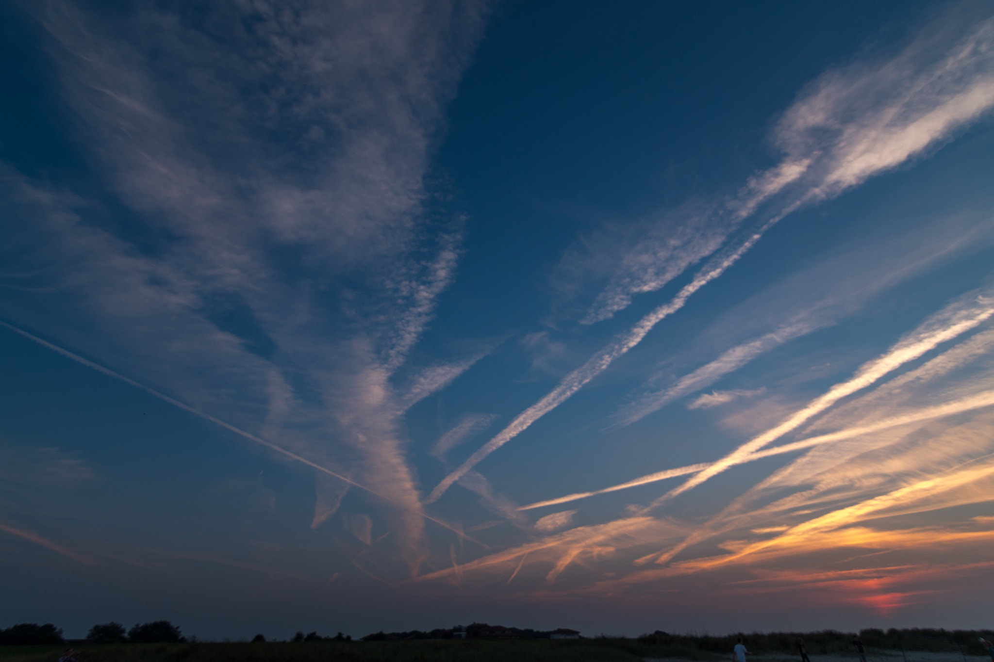 Tokina AT-X Pro 11-16mm F2.8 DX II sample photo. Bright cloud strips in a blue evening sky just after sunset photography