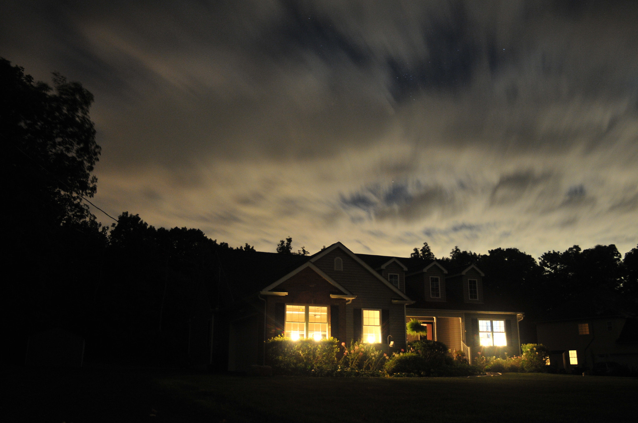 Tamron AF 19-35mm f/3.5-4.5 (A10) sample photo. Clouds over house photography