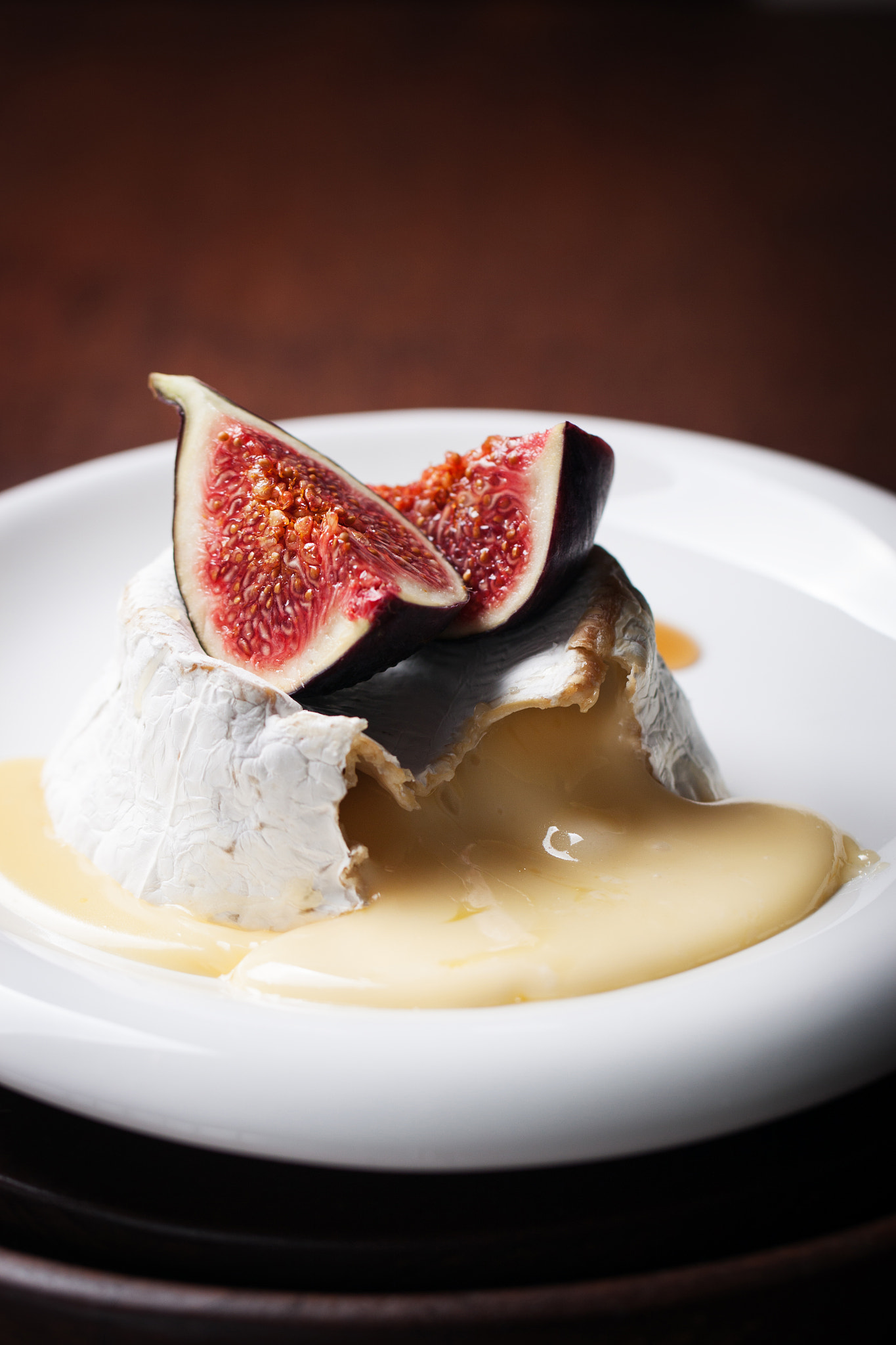 Canon EOS 50D + Canon EF 100mm F2.8L Macro IS USM sample photo. Baked camembert with fresh figs and honey on a wooden background, closeup photography