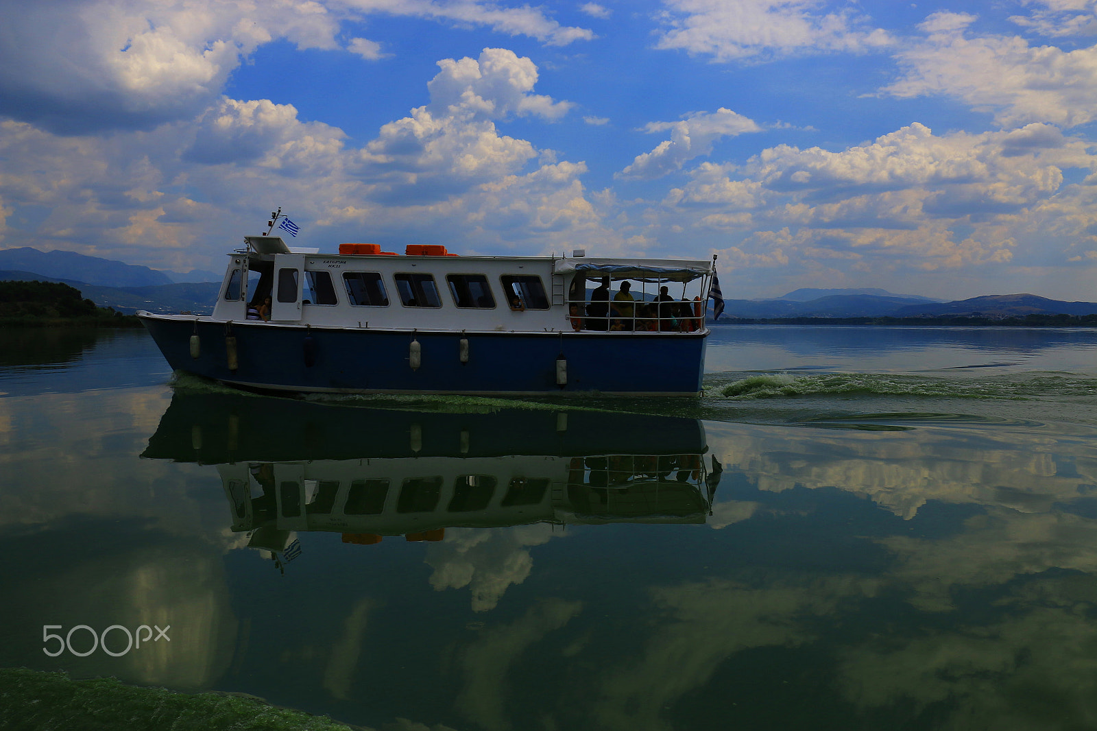 Canon EOS 70D + Canon EF 14mm F2.8L II USM sample photo. A boat between clouds photography