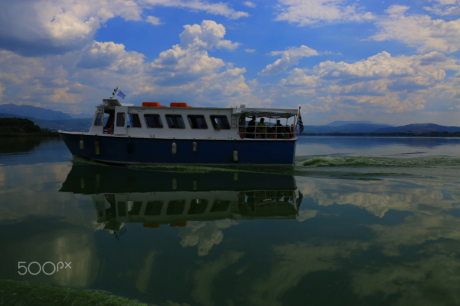 Canon EF 14mm F2.8L II USM sample photo. A boat between clouds photography