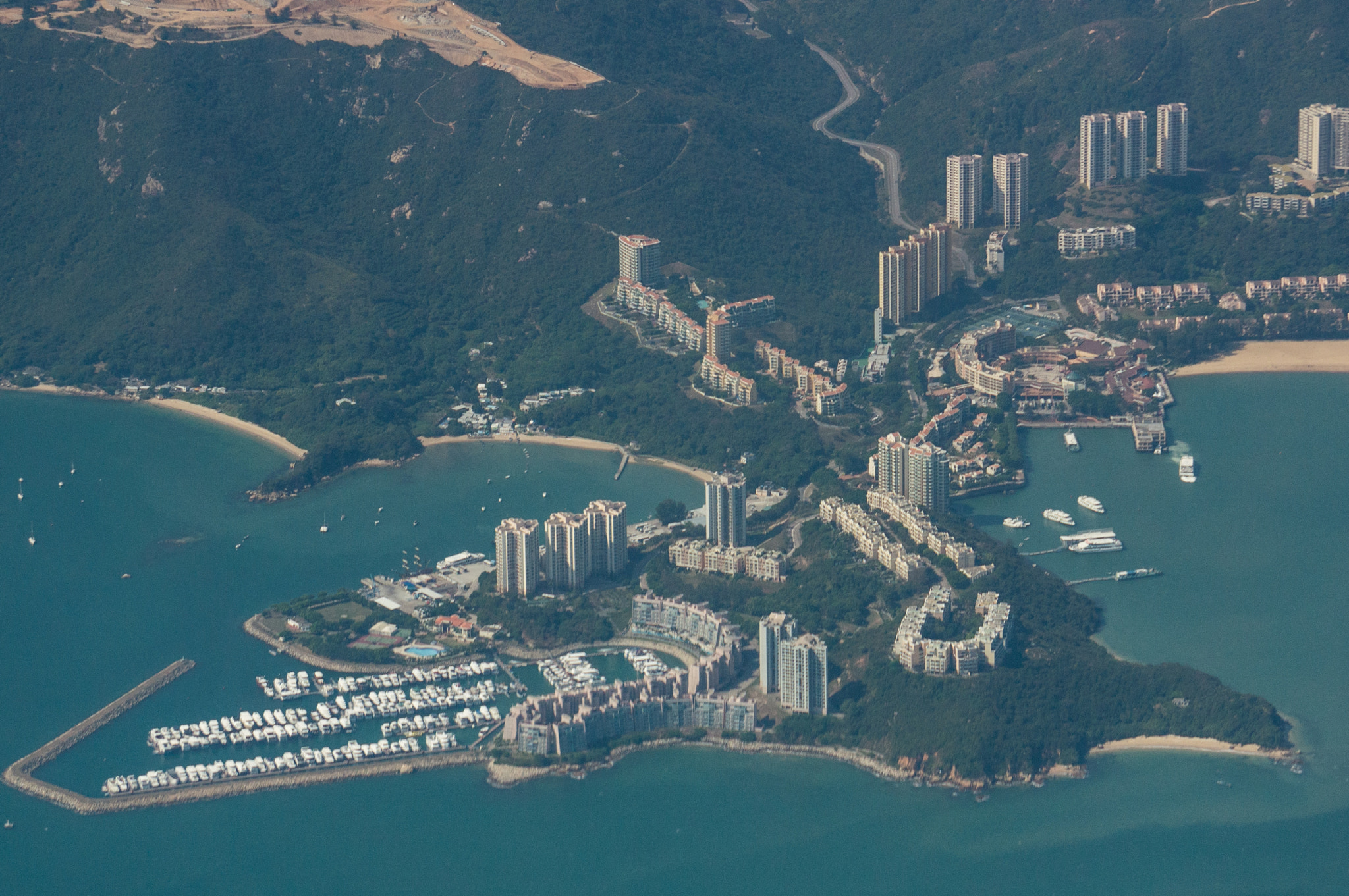 Sony Alpha NEX-5N + Sony E 55-210mm F4.5-6.3 OSS sample photo. Discovery bay, hong kong photography