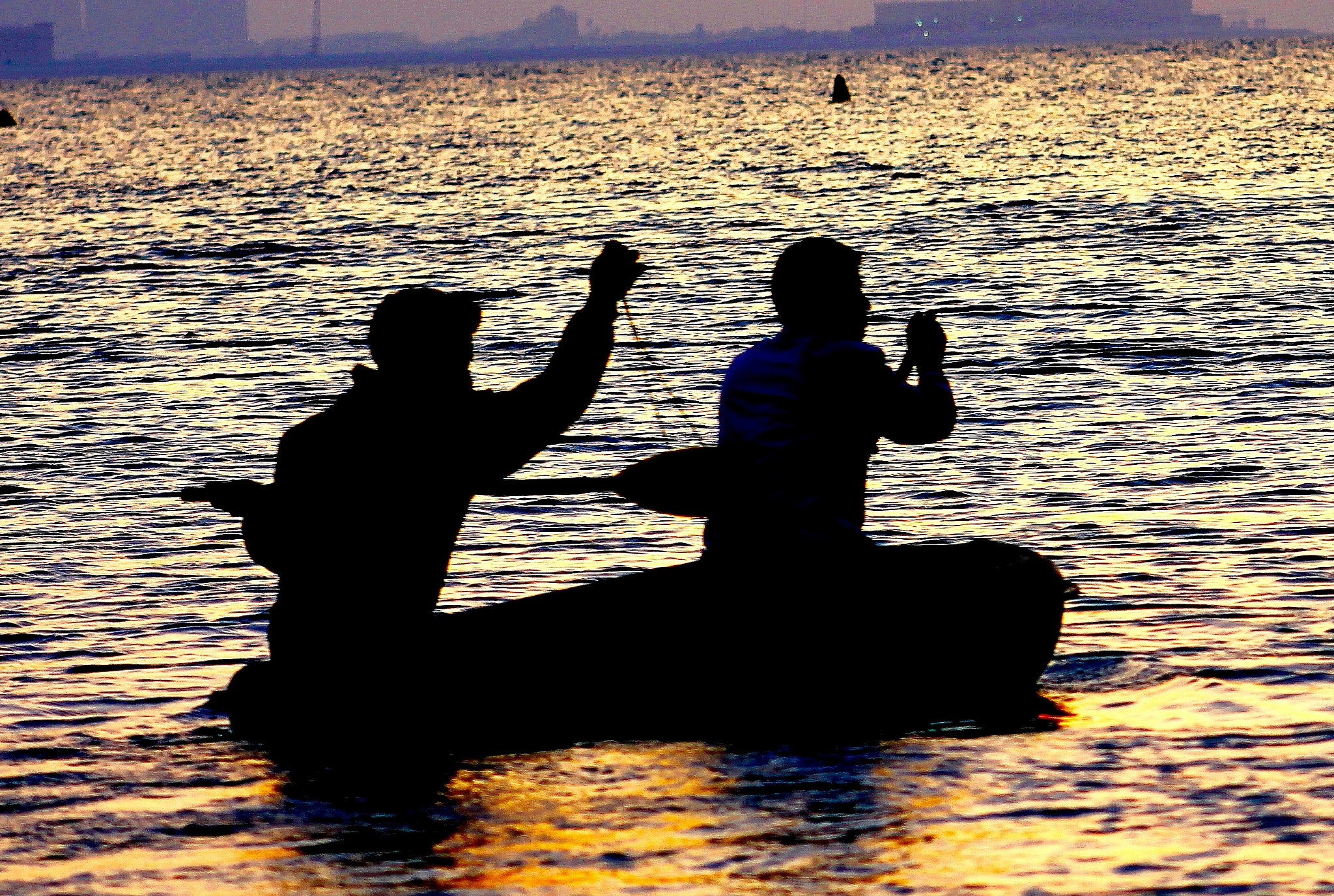 Canon EF75-300mm f/4-5.6 sample photo. Quietly checking the fishing lines under a golden sunset off jumeirah beach dubai photography