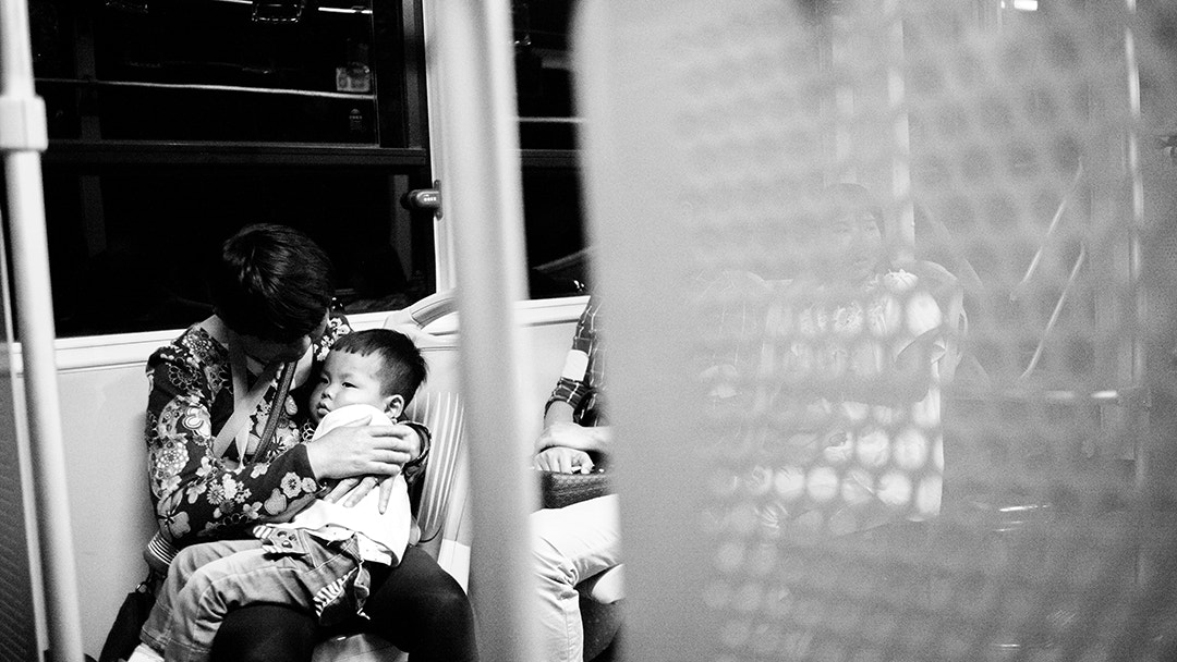Canon EOS 5DS + Canon EF 35mm F2 sample photo. Sleeping in the grandmother's arms photography