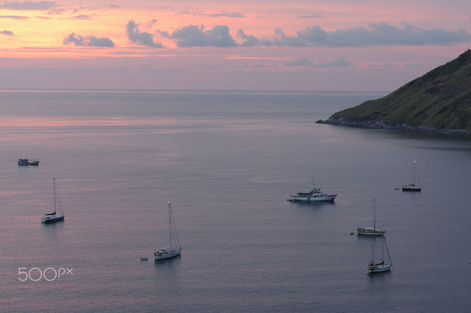 Pentax K-3 + Pentax smc DA* 55mm F1.4 SDM sample photo. A sunset above sailingboats near a island photography