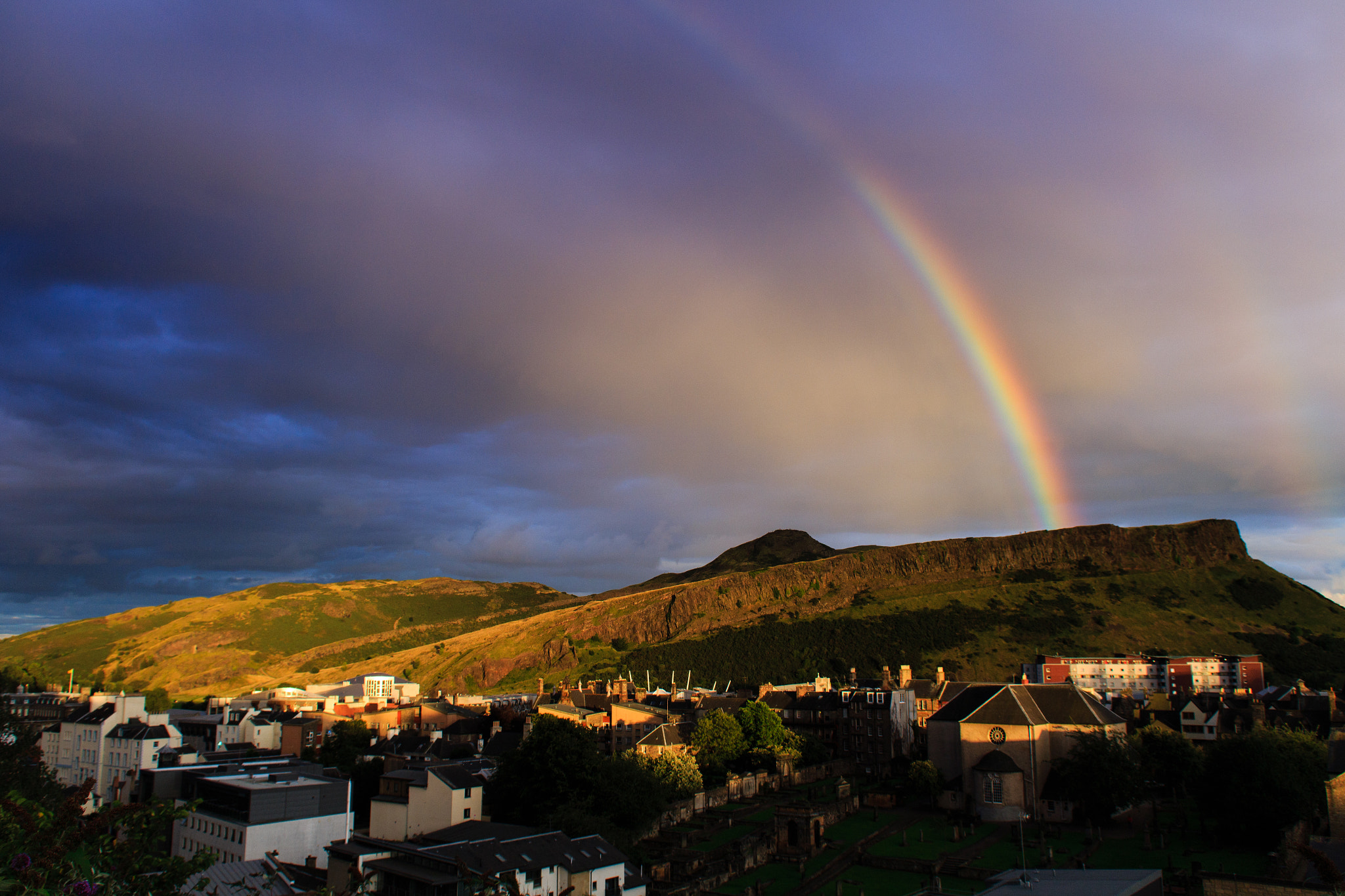 Canon EOS 100D (EOS Rebel SL1 / EOS Kiss X7) + Sigma 18-50mm F2.8-4.5 DC OS HSM sample photo. Rainbow over arthurs seat photography