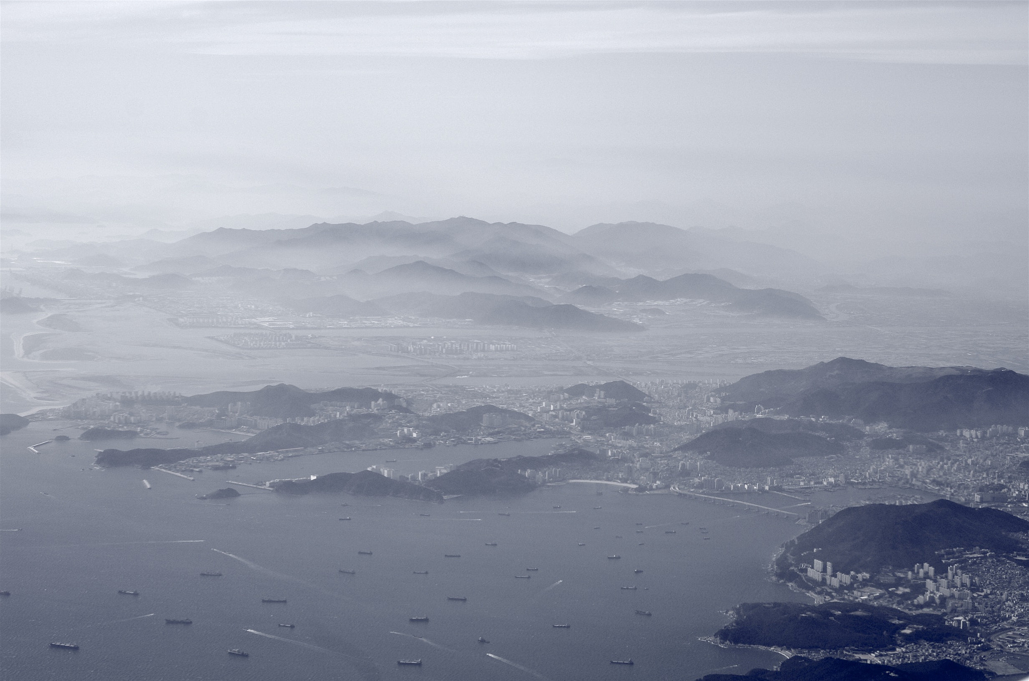 Pentax K-5 II + Pentax smc DA 50mm F1.8 sample photo. Flying towards busan photography