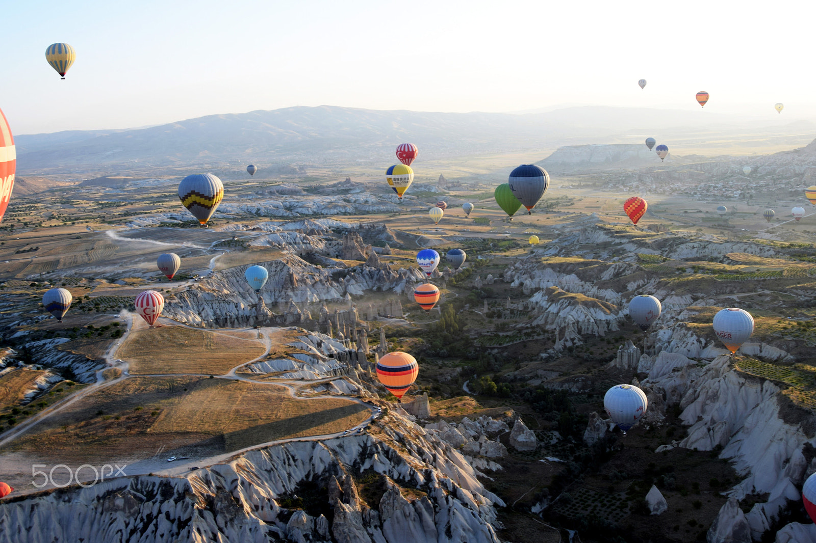 Nikon D5300 + AF Nikkor 28mm f/1.4D sample photo. Flying ballons at sunrise in capadocia, turkey photography