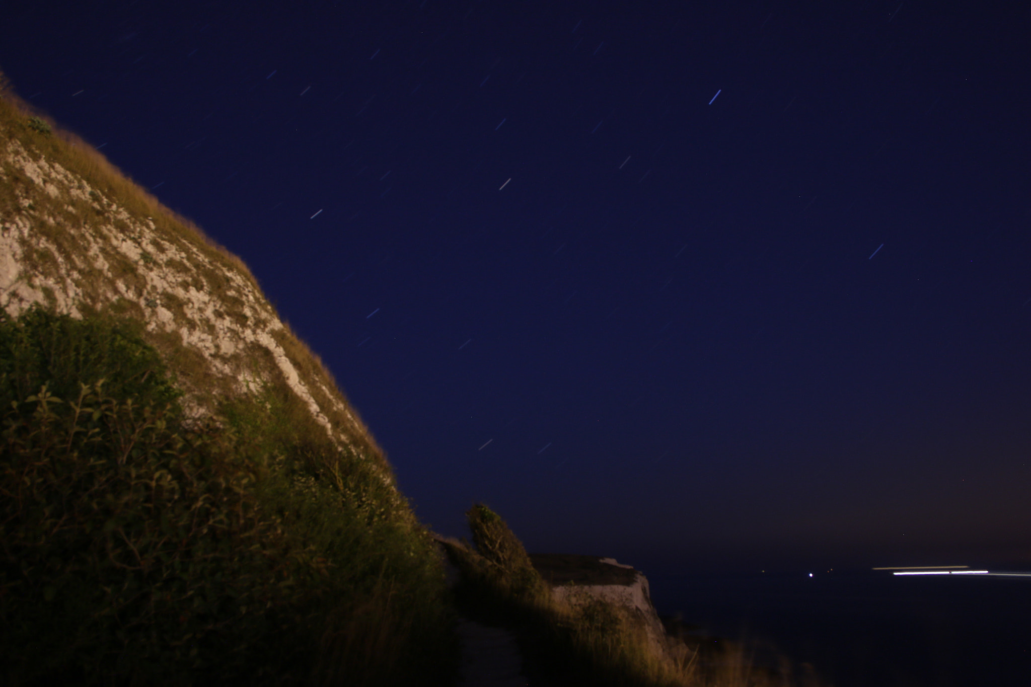 Sigma 18-125mm F3.8-5.6 DC OS HSM sample photo. White cliffs at night photography