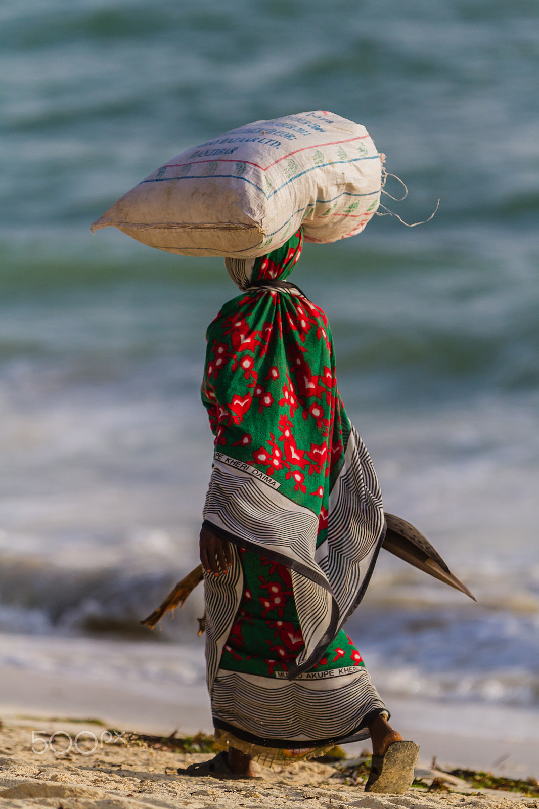 Canon EOS 7D + Canon EF 300mm F2.8L IS USM sample photo. Woman in zanzibar, tanzania photography
