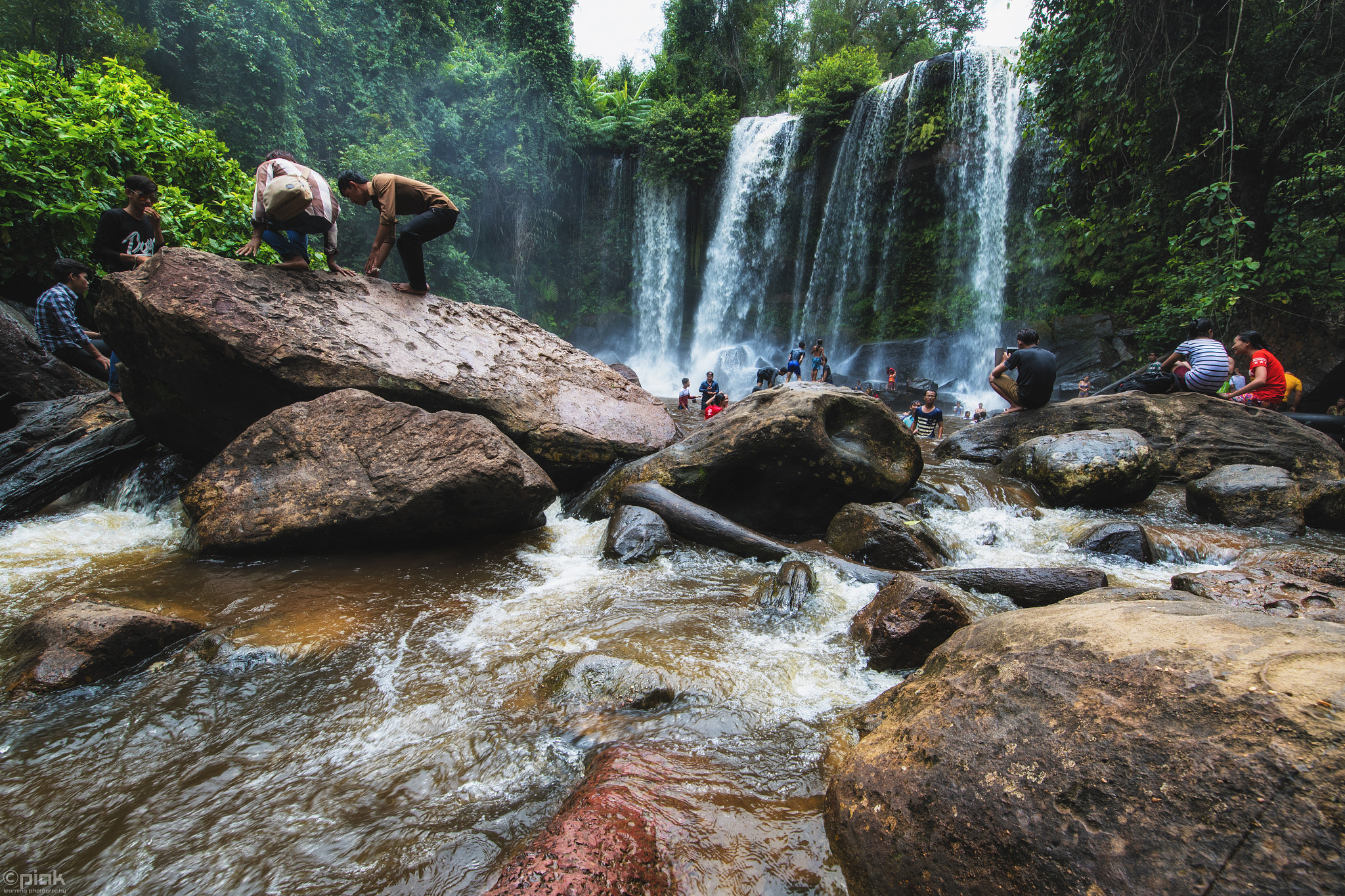 Canon EF 300mm f/2.8L sample photo. Tourist and waterfall photography