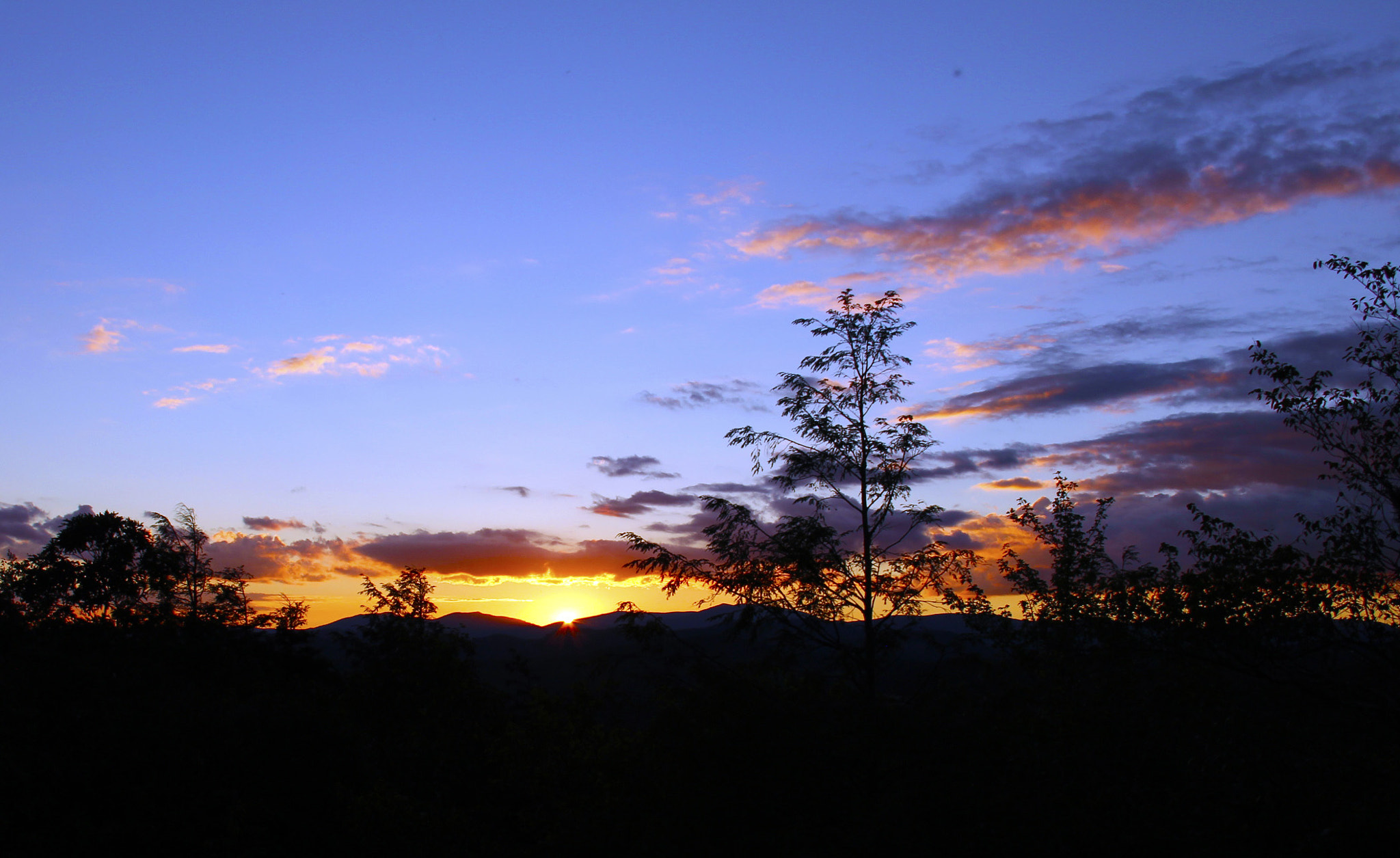 Canon EF-S 18-200mm F3.5-5.6 IS sample photo. Flat rock at sunset photography