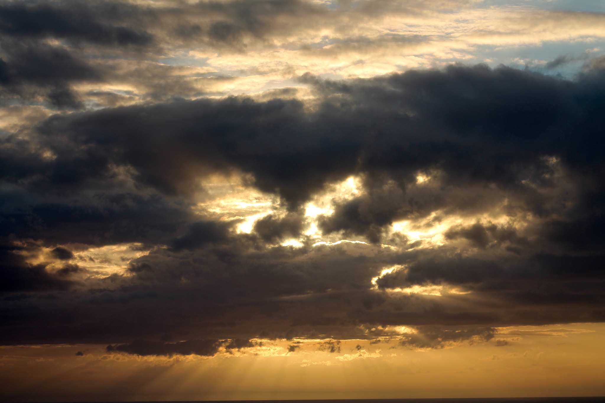 Canon EF75-300mm f/4-5.6 sample photo. Storm and sunset colliding photography