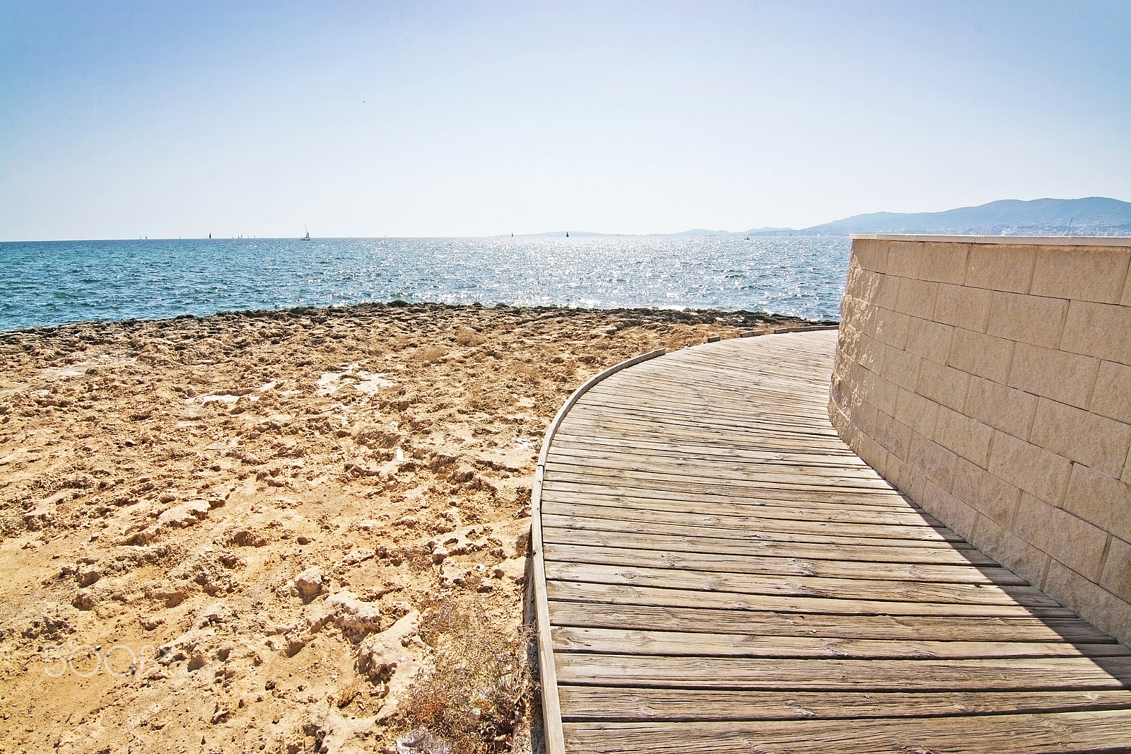 Sigma 8mm F3.5 EX DG Circular Fisheye sample photo. Curved wood planks boardwalk photography