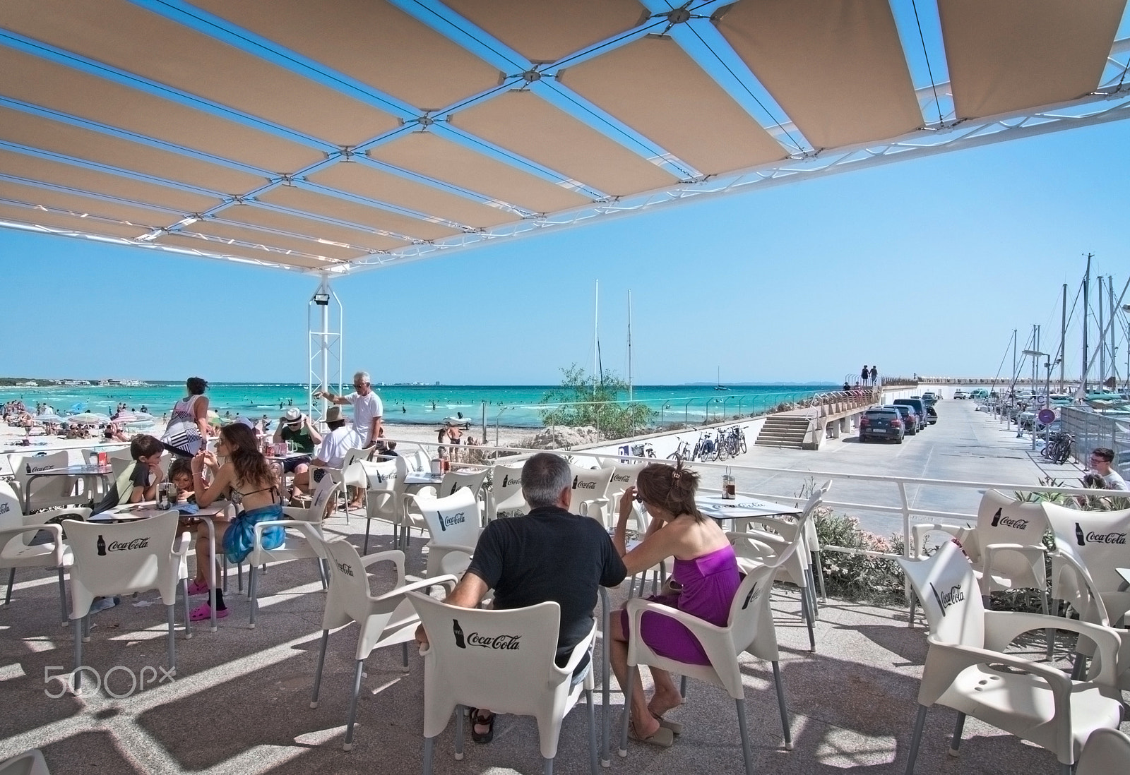 AF Zoom-Nikkor 35-105mm f/3.5-4.5 sample photo. People in outdoor restaurant sa rapita photography