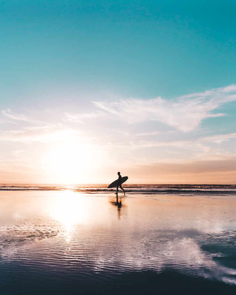 Surfer on the horizon by Ashley McKinney on 500px.com