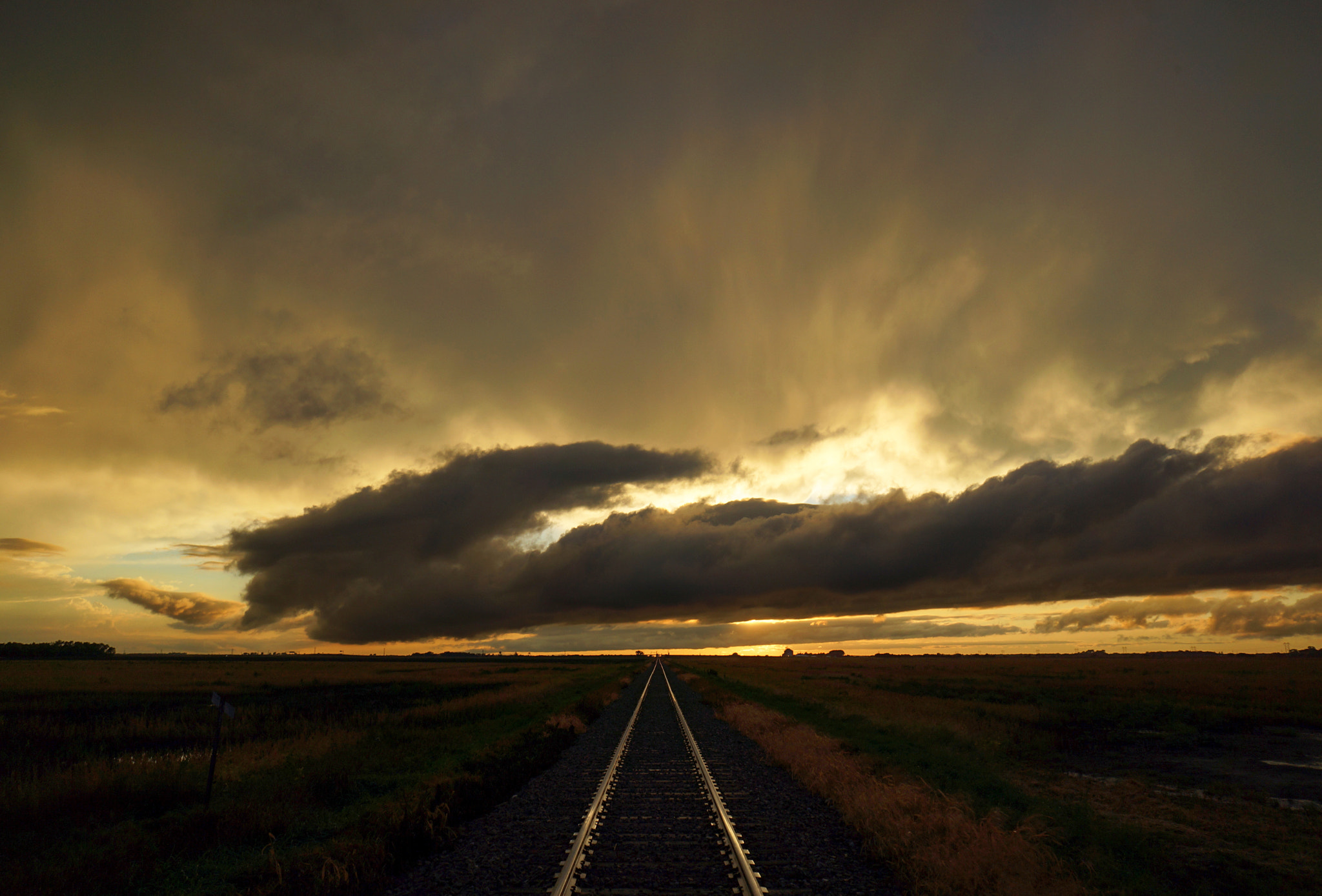 Sony Alpha NEX-7 + Sony E 16mm F2.8 sample photo. Storm and sun photography