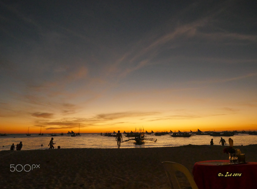 Olympus Zuiko Digital ED 9-18mm F4.0-5.6 sample photo. Fisherman returning home after a long day photography