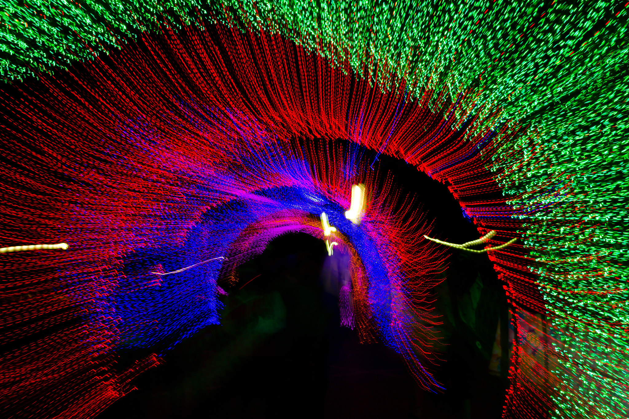 Nikon D3100 + 18.00 - 55.00 mm f/3.5 - 5.6 sample photo. Tunnel of neon light in new year photography