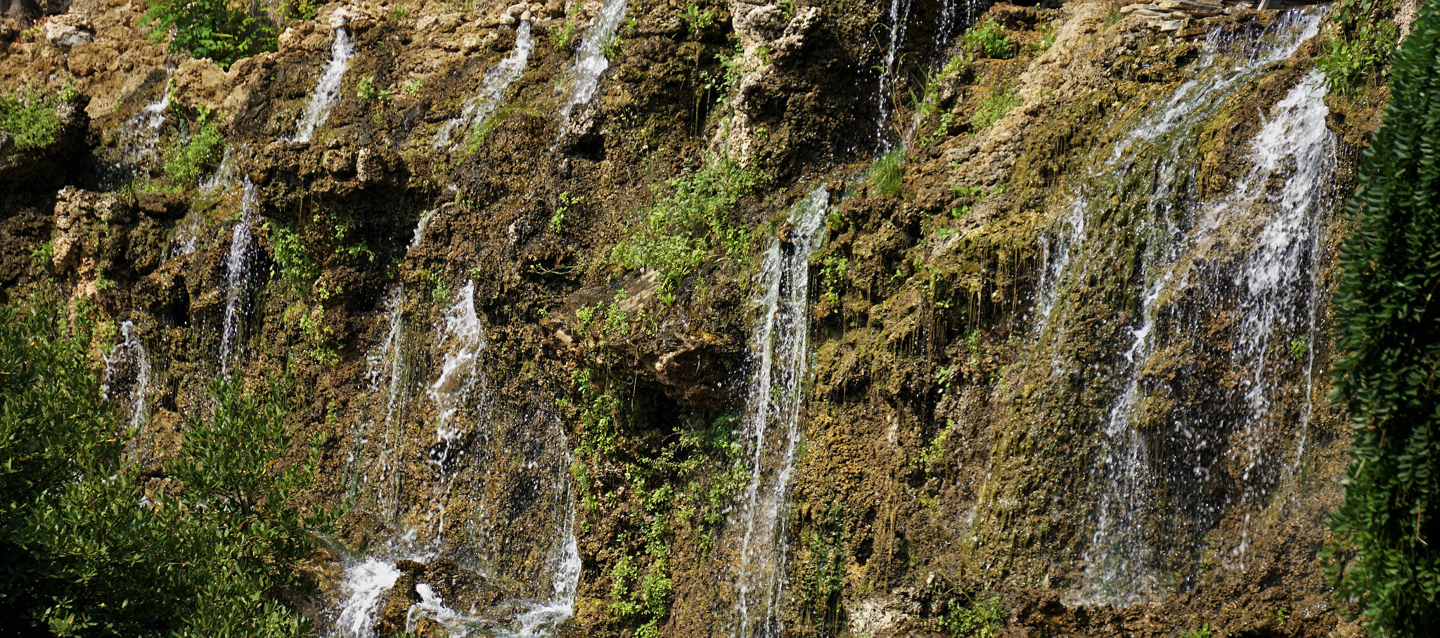 Sony E 55-210mm F4.5-6.3 OSS sample photo. Rocks and water photography