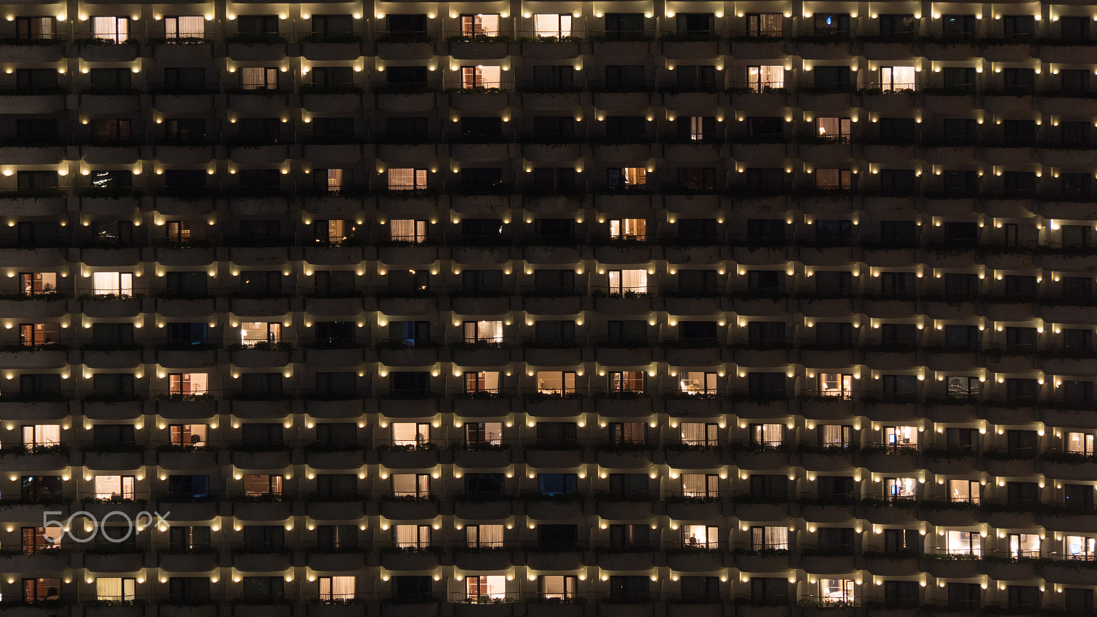 Panasonic Lumix DMC-GH4 sample photo. Multistorey block of flats at night photography