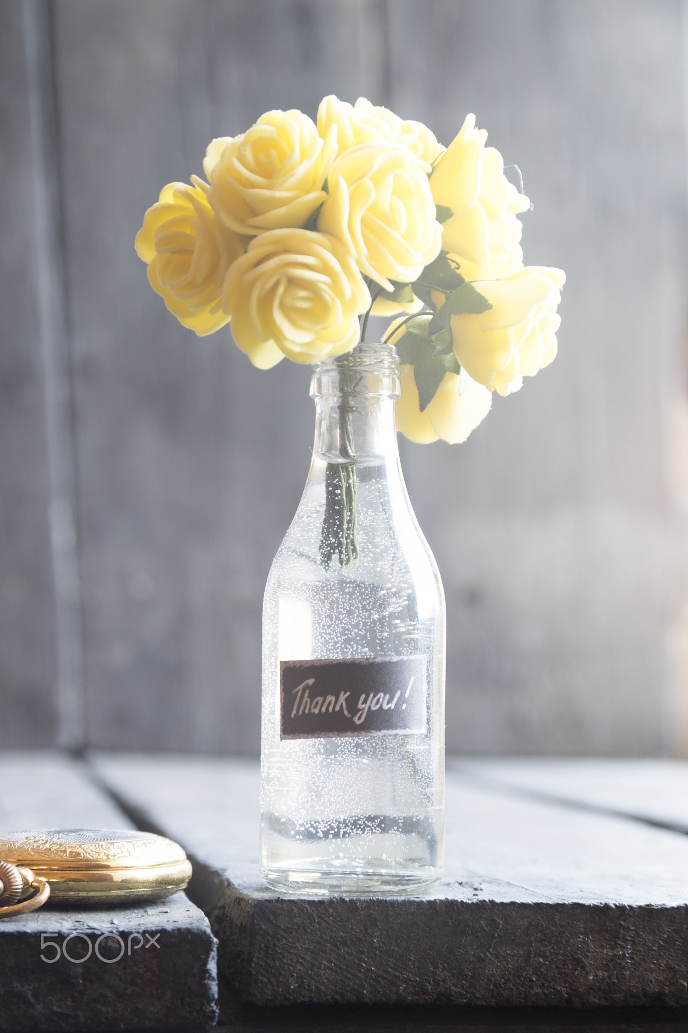 Bouquet with rose and lettering thank you. High key.