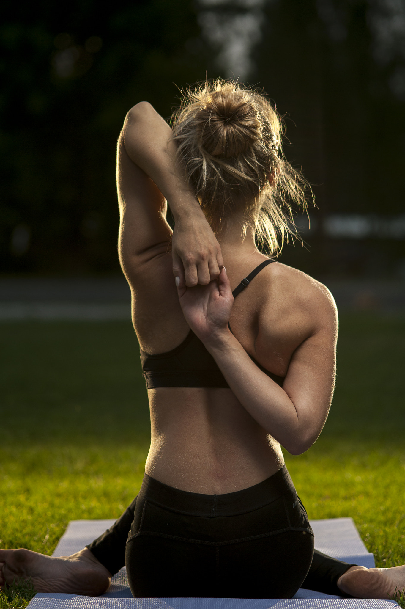 Nikon D700 + AF Micro-Nikkor 105mm f/2.8 sample photo. Yoga woman practicing on green grass photography