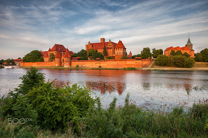 Canon EF 24mm F2.8 IS USM sample photo. Malbork castle in poland at sunset photography