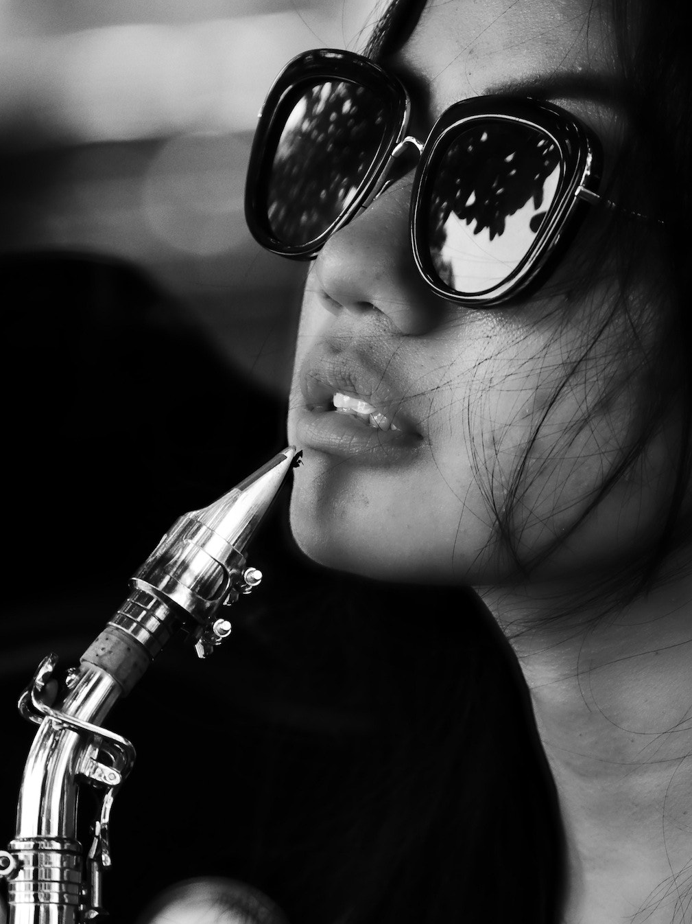 Panasonic Lumix DMC-GH4 + LEICA DG 100-400/F4.0-6.3 sample photo. The sax player 1 photography
