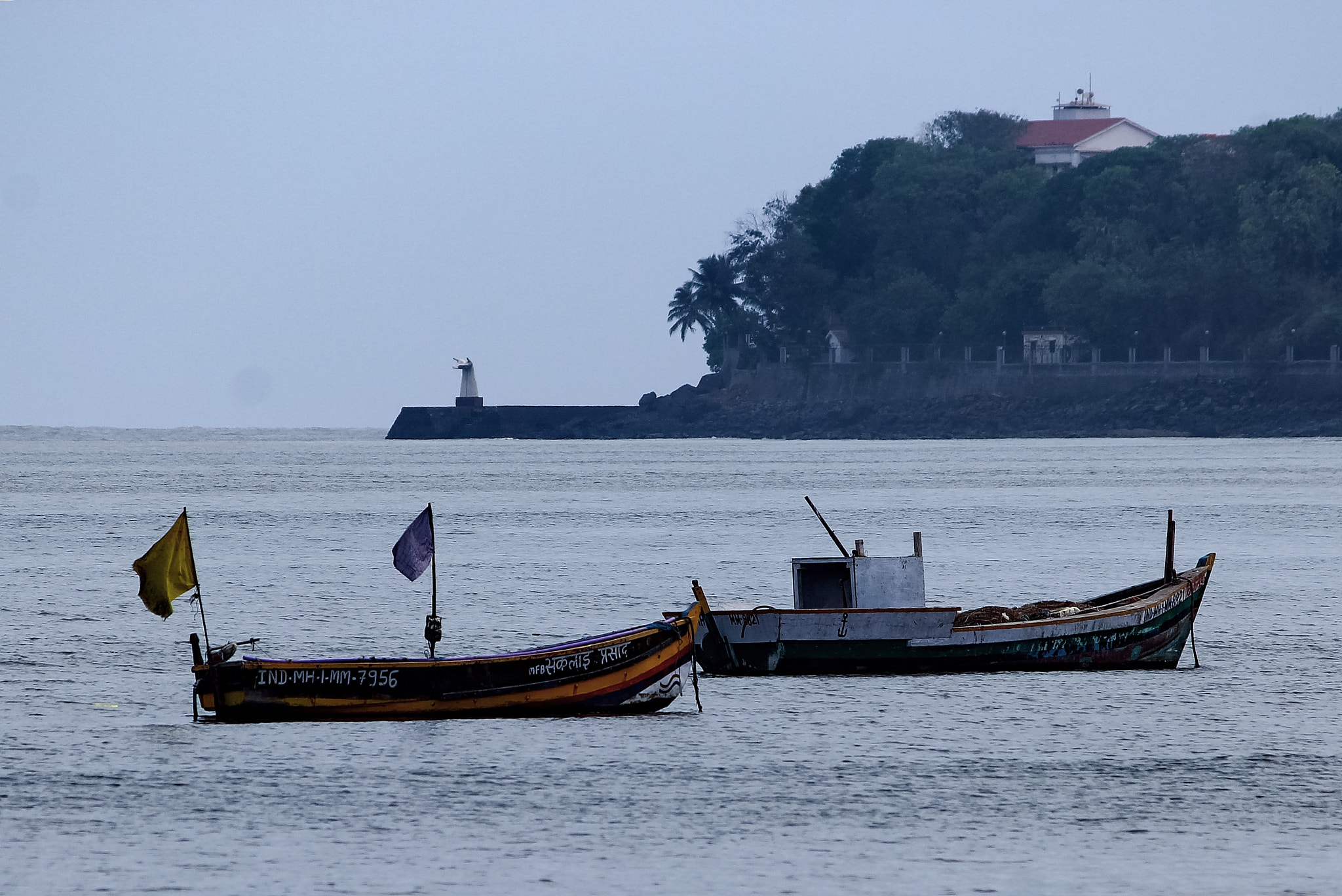 Canon EF-S 55-250mm F4-5.6 IS II sample photo. Light house and boats photography