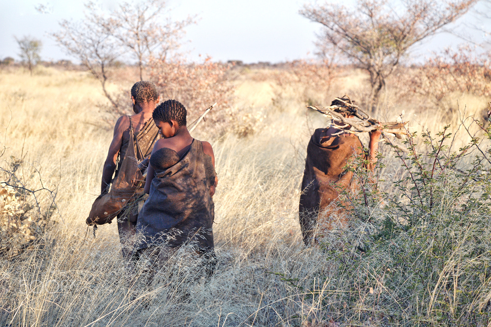 Canon EF-S 18-135mm F3.5-5.6 IS USM sample photo. A family of bushmen (san) in the kalahari in botswana photography