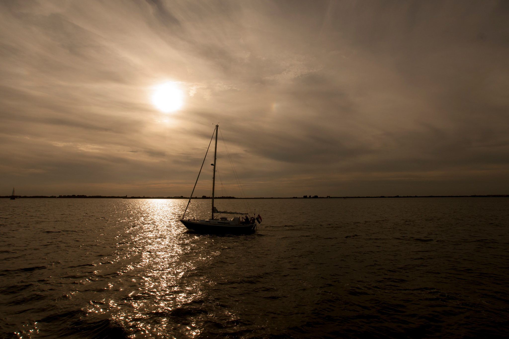 Sony Alpha DSLR-A700 + Sony DT 11-18mm F4.5-5.6 sample photo. Boat at sunset photography
