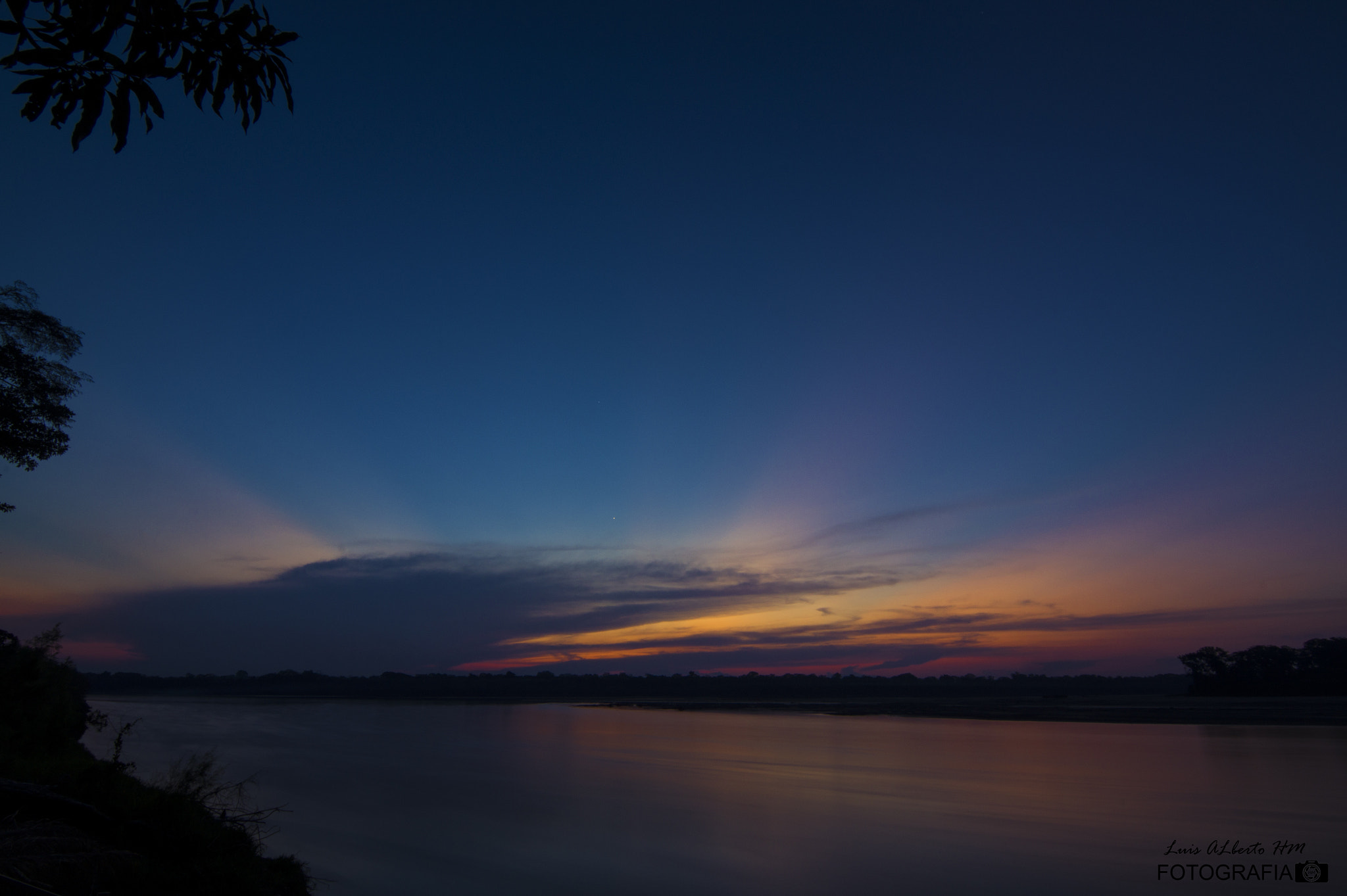 Sony SLT-A58 + 20mm F2.8 sample photo. Ocaso en el rio madre de dios photography