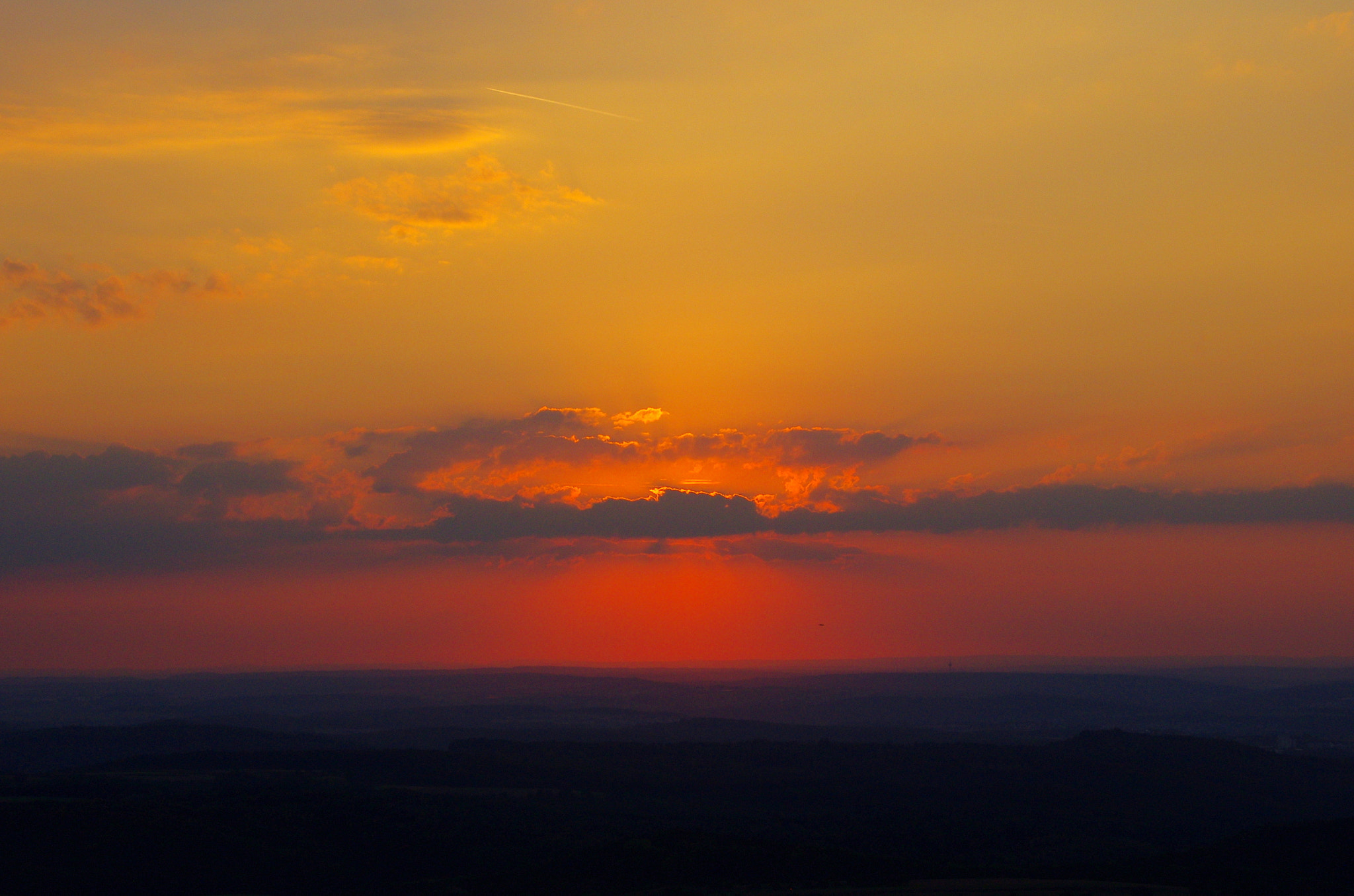 Pentax K-5 sample photo. Colors of sunset - the sun behind the clouds photography