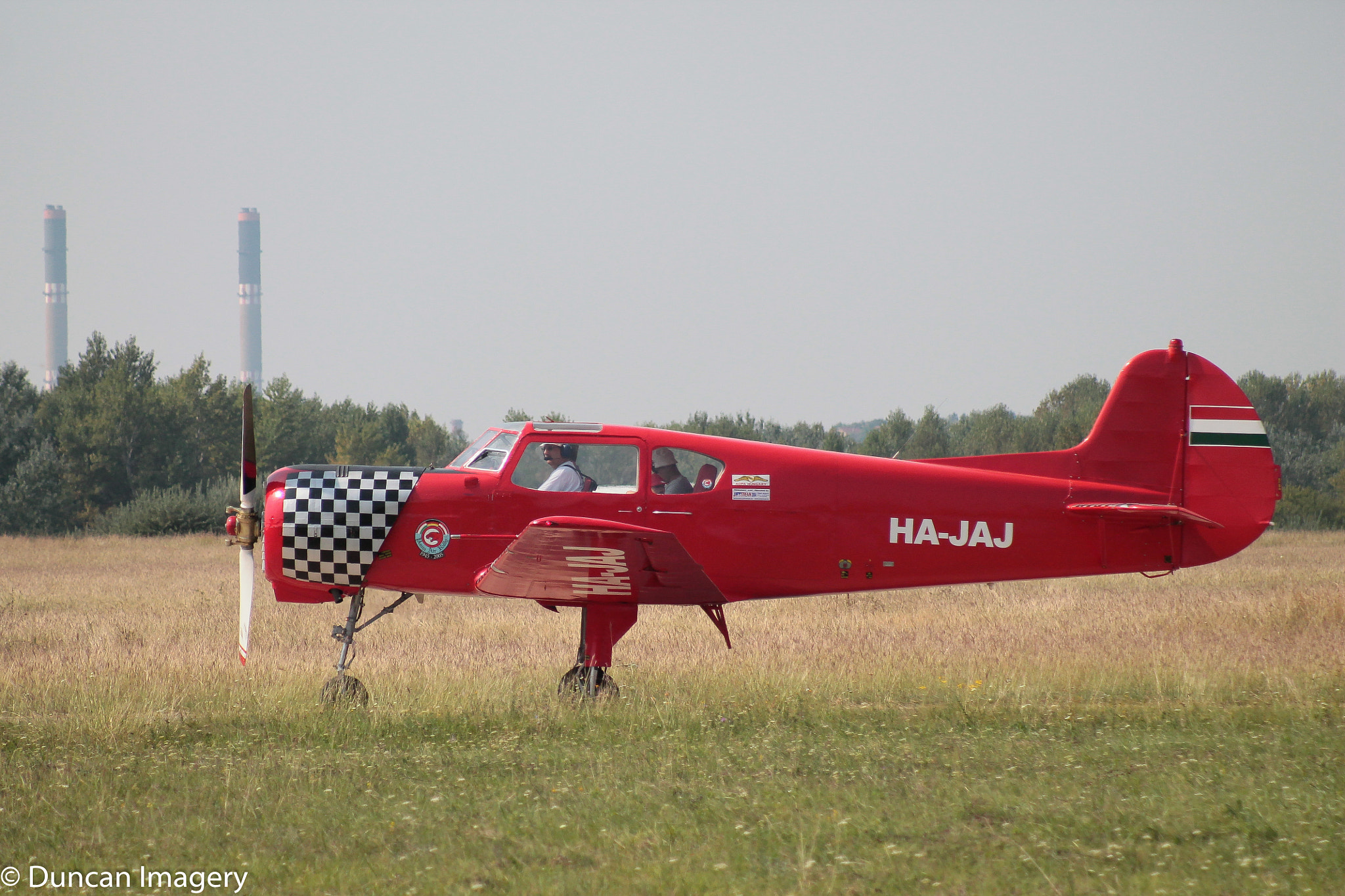 Canon EF 80-200mm F4.5-5.6 II sample photo. Red plane photography