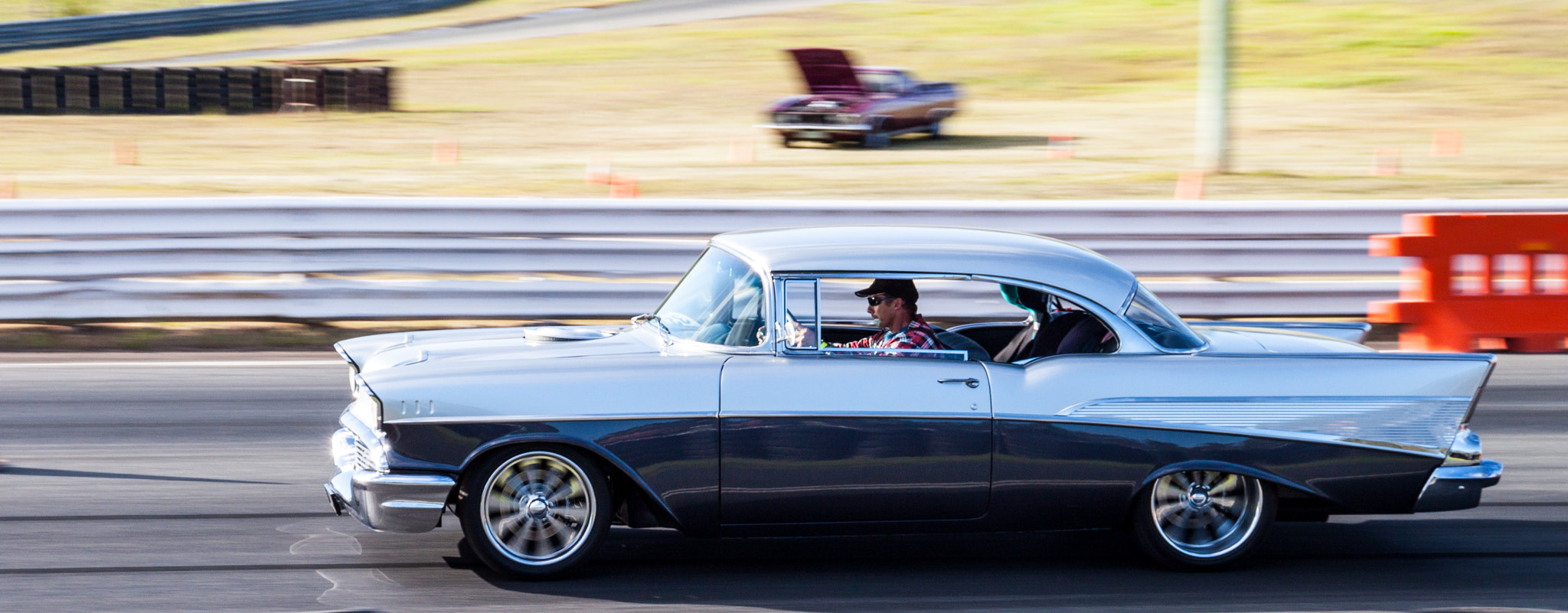 Canon EOS 500D (EOS Rebel T1i / EOS Kiss X3) sample photo. '57 chevy on the move photography
