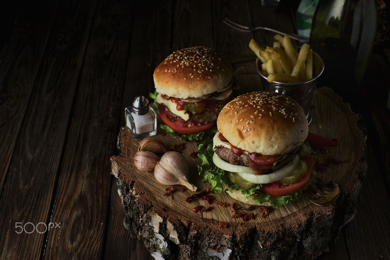 Sony a99 II sample photo. Two beef burgers on a dark background. photography