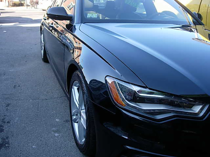 Nikon E5200 sample photo. Damaged audi in fender bender boston - allston collision center - after photography